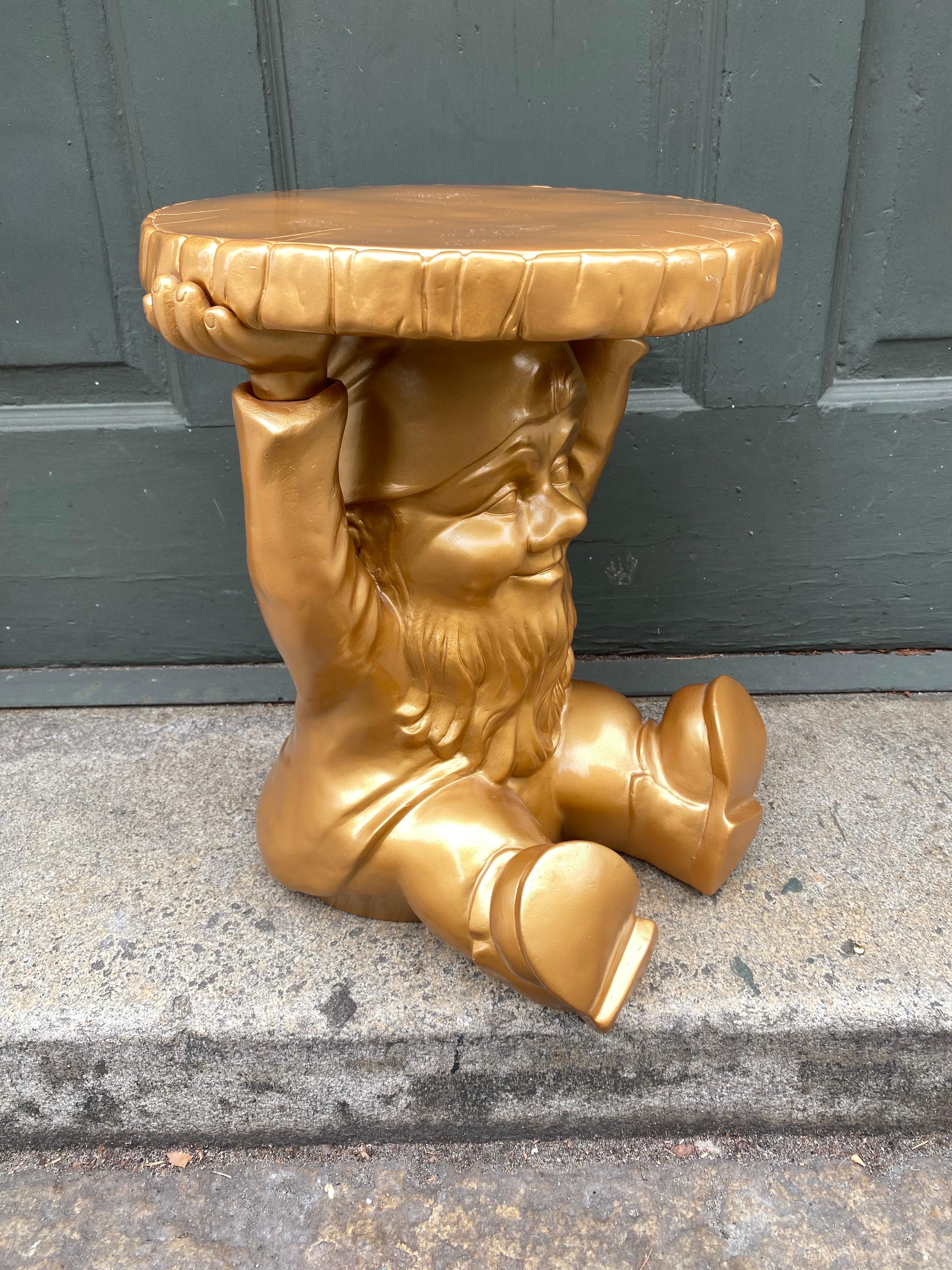 Philippe Starck for Kartell Gold Gnome.  Injection Plastic Construction, indoor/outdoor use.  Clever Fun Little piece that works as a table or stool!  This one is very clean and appears almost new!