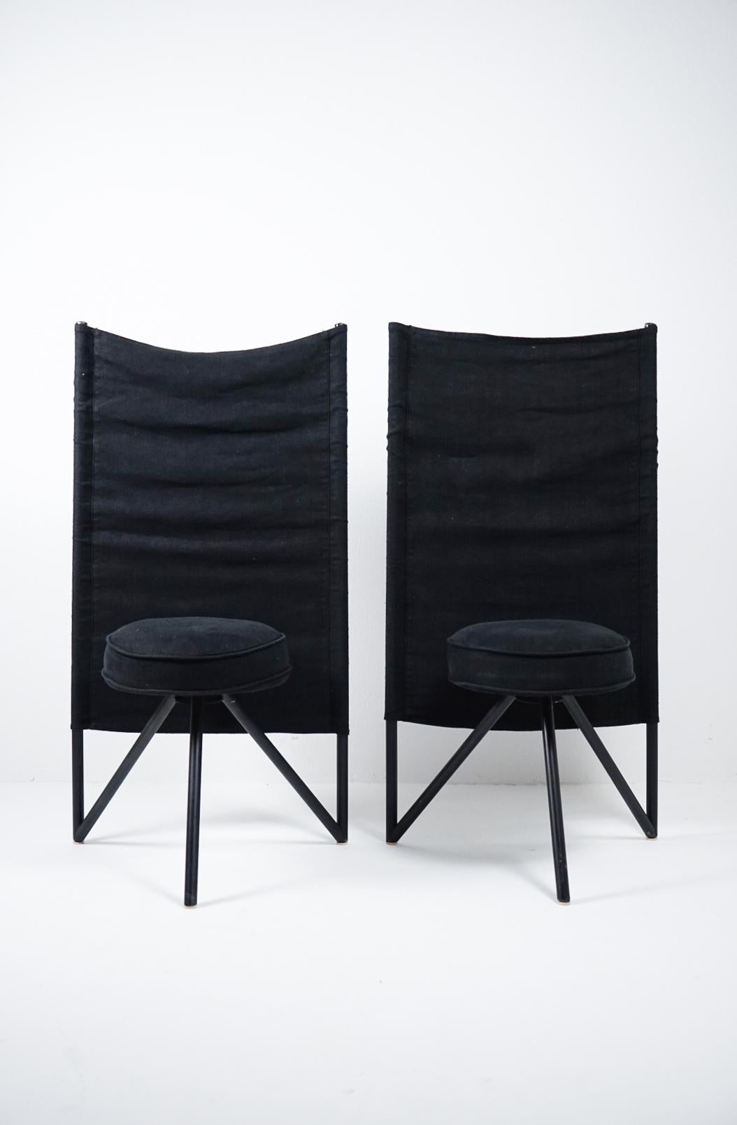 Rare Post Modern Pair of Miss Wirt Chairs by Philippe Starck for Disform in original black linen. Miss Wirt tripod, three legged chairs produced in Spain 1982/198 by Disform. Black cotton linen fabric is stretched over two vertical steel tubes and