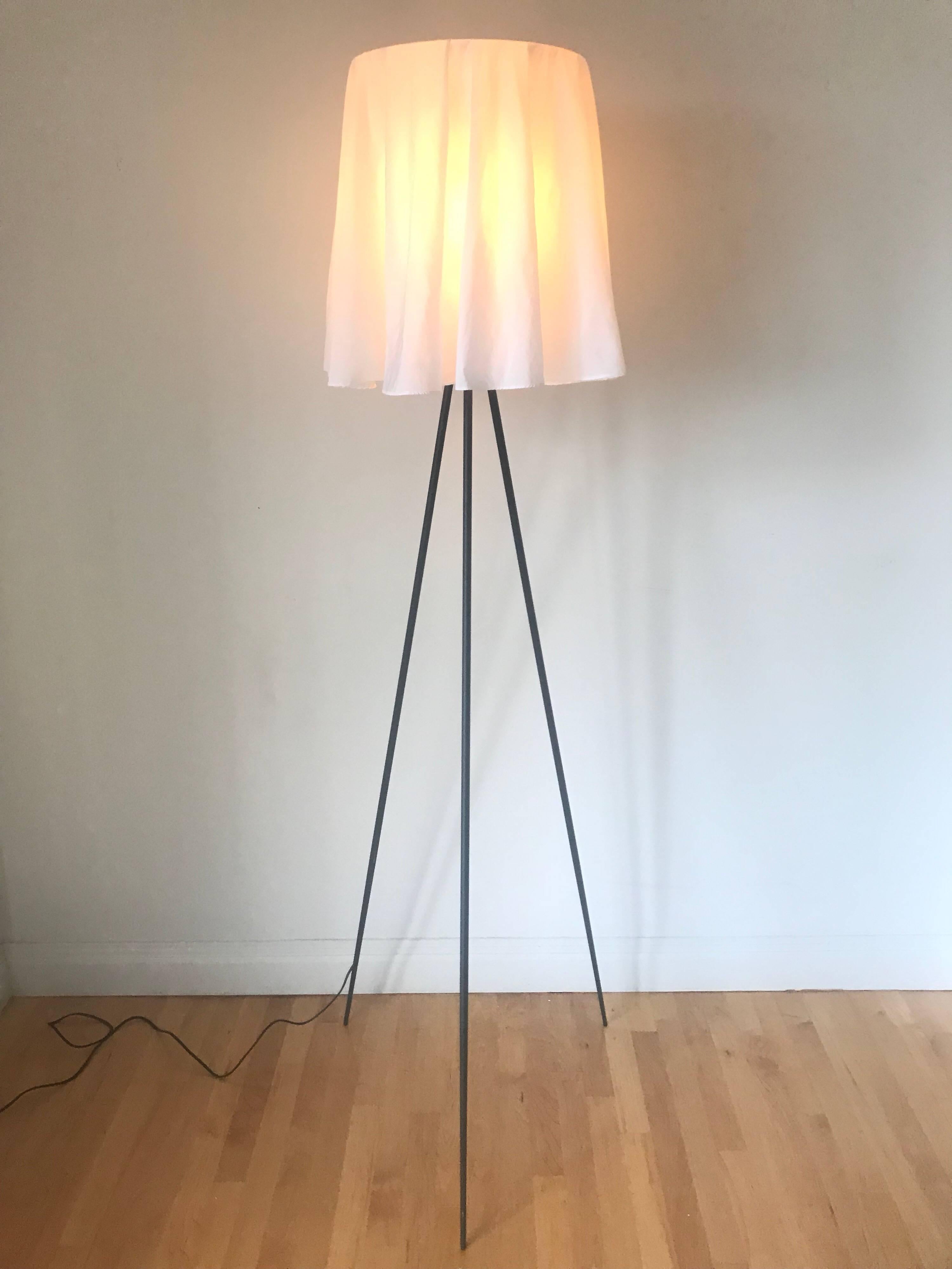 Post Modern ghost like standing floor lamp designed by Philippe Starck for Flos, black metal frame and draped hanging fabric shade
