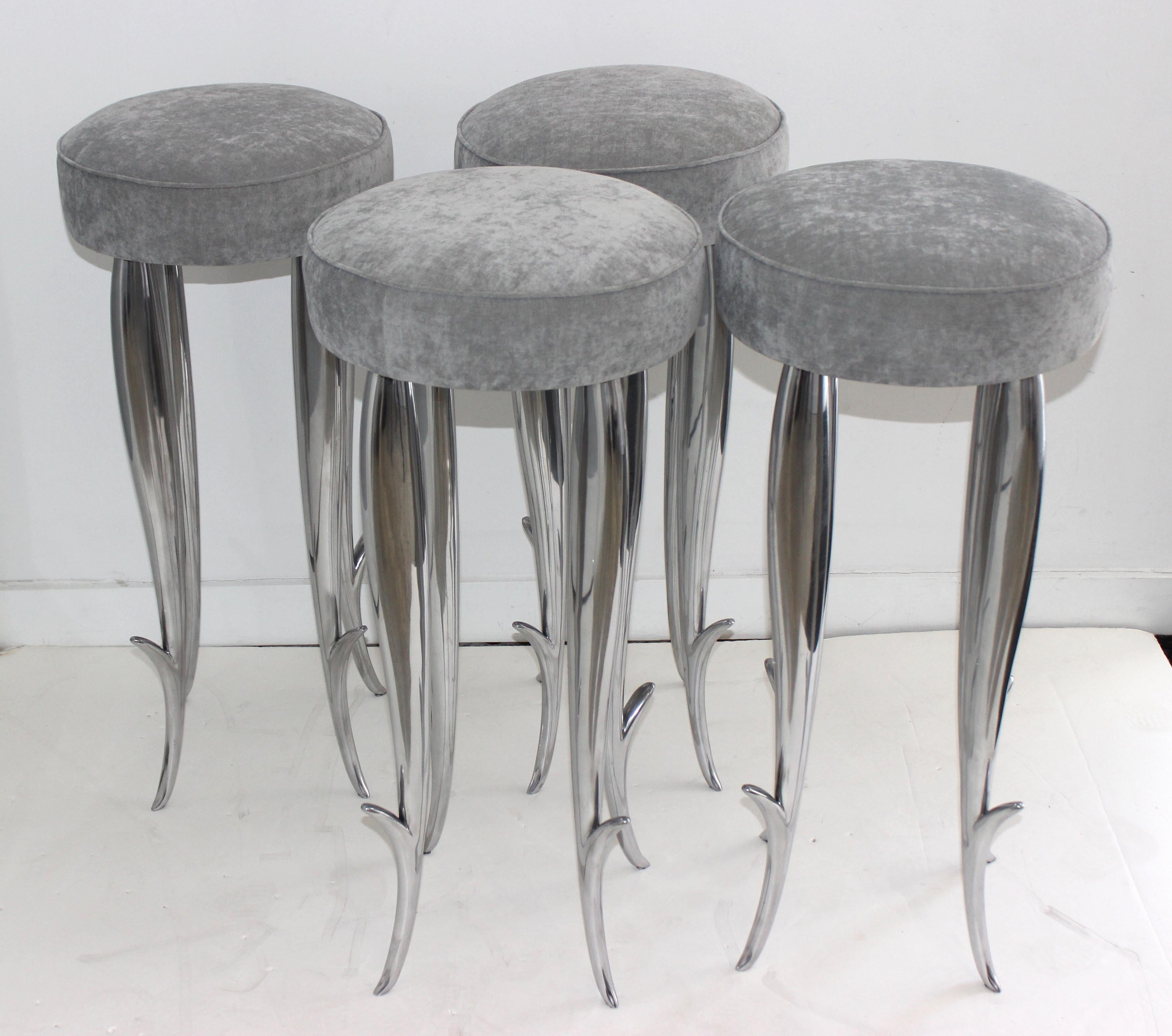 Remarkable set of Philippe Starck Bar Stools designed for the luxury Manhattan mid-town boutique hotel in the 1990s. This has the imprint STARCK.XO and has the 4