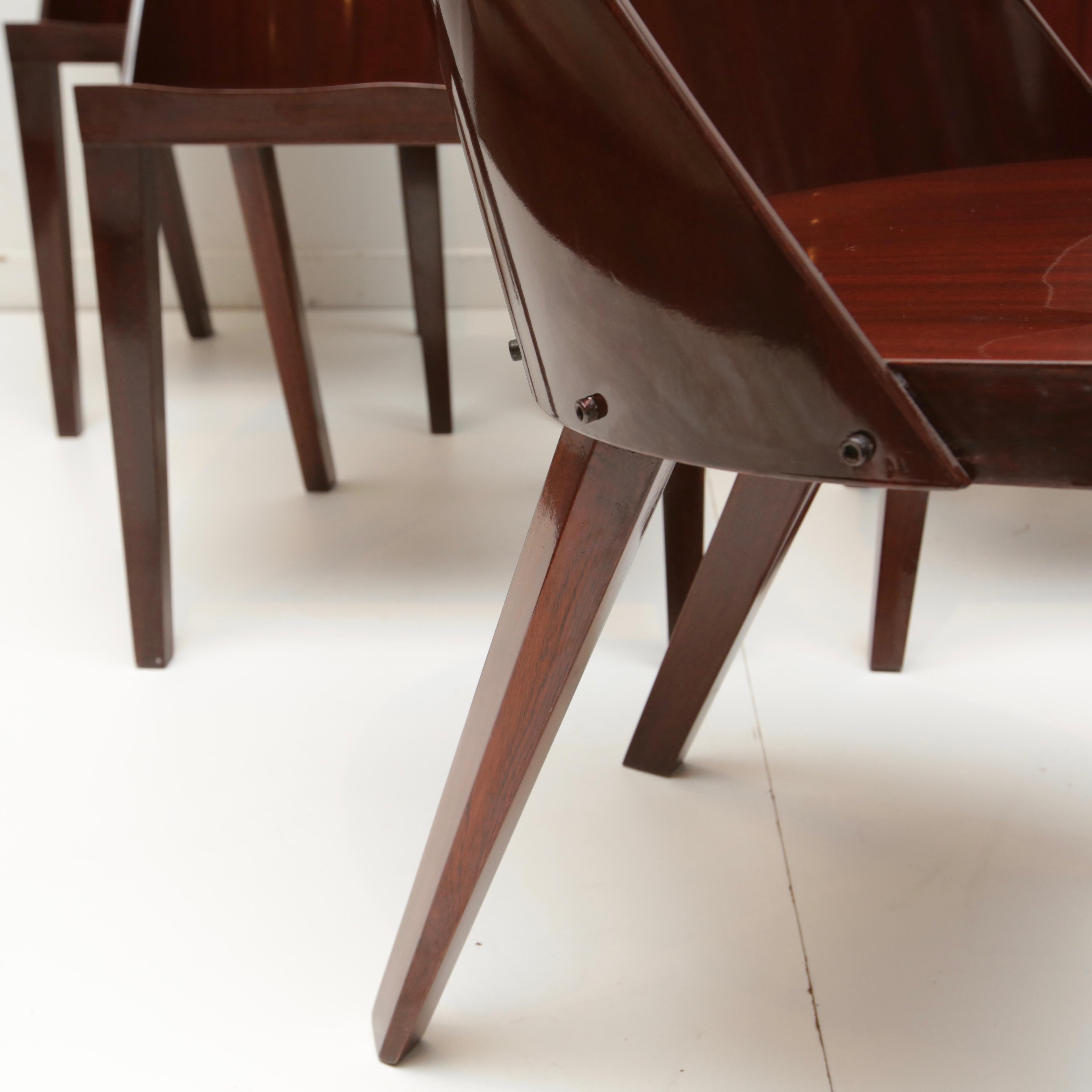 Set of six mahogany veneer chairs designed by Starck for the Royalton Hotel.