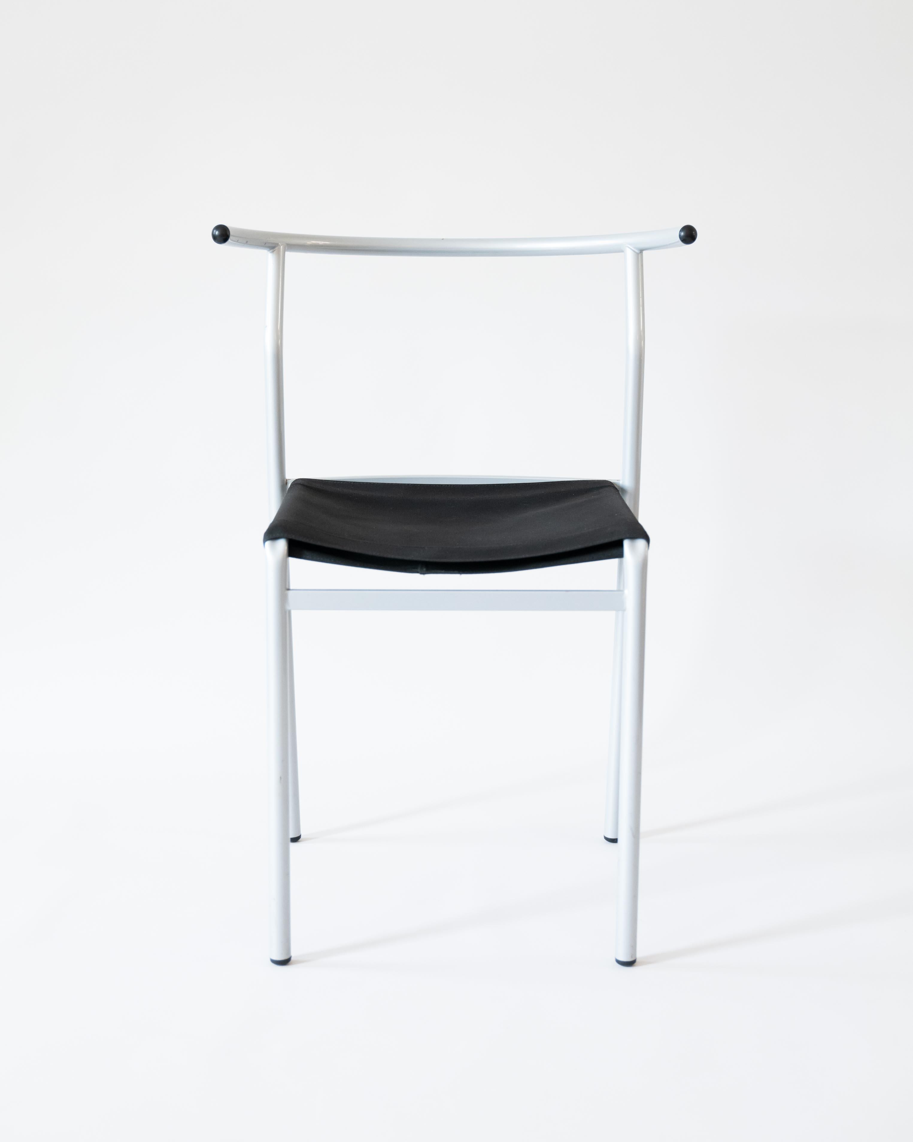 A set of four chairs designed by Philippe Starck for Café Costes in Paris, manufactured by Cerruti Baleri in 1984. The seat is made out of thick rubber and the frame is steel pipe powder coated silver grey. Comfortable and solid: the ideal chair for