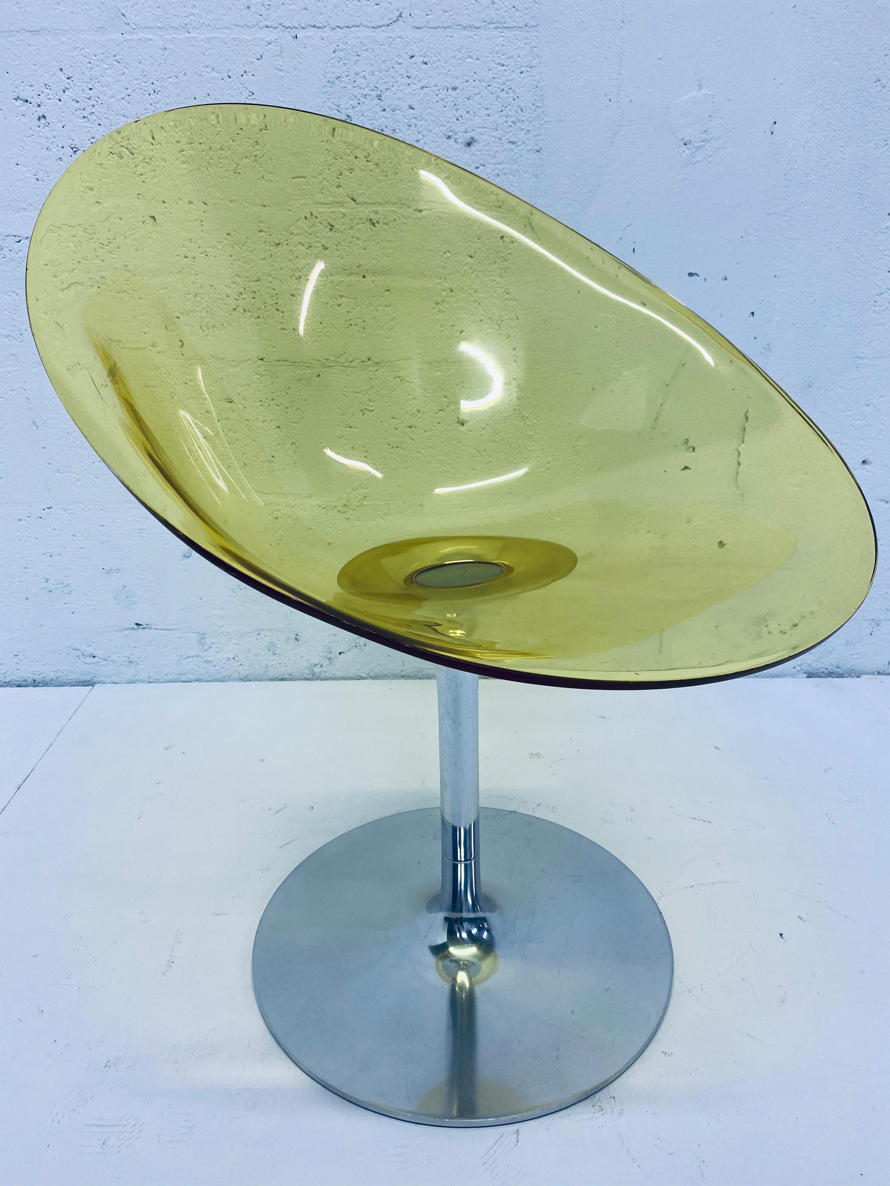 Yellow Eros chair with aluminum swivel base by Philippe Starck for Kartell. Made in Italy.