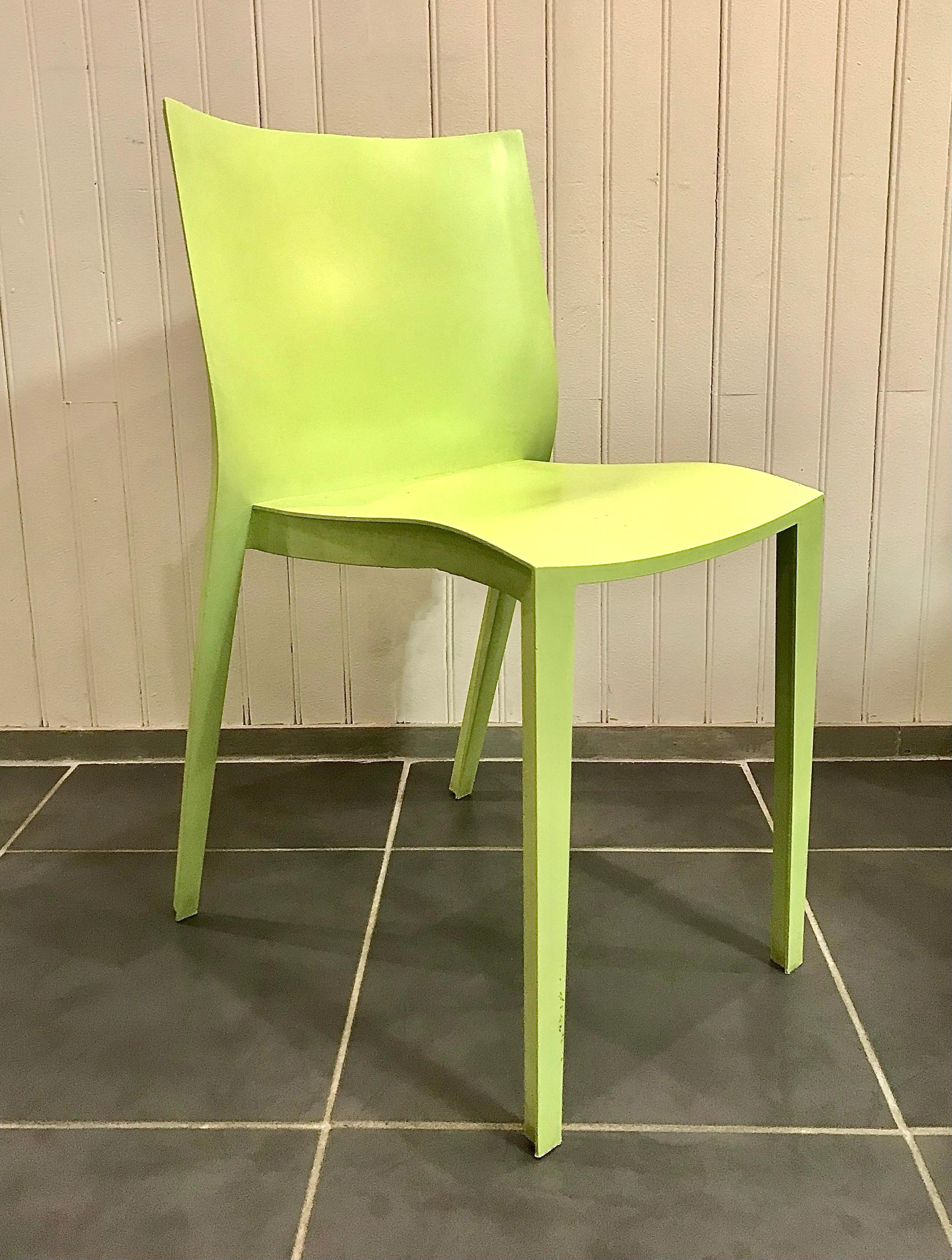 Set of 7 designer chairs by Philippe Starck, named Slick Slick XO. 

Slick Slick is the chair at its most essential. It is emblematic of Starck's creativity and vision. He wants to offer the right product at the right price. This chair is very
