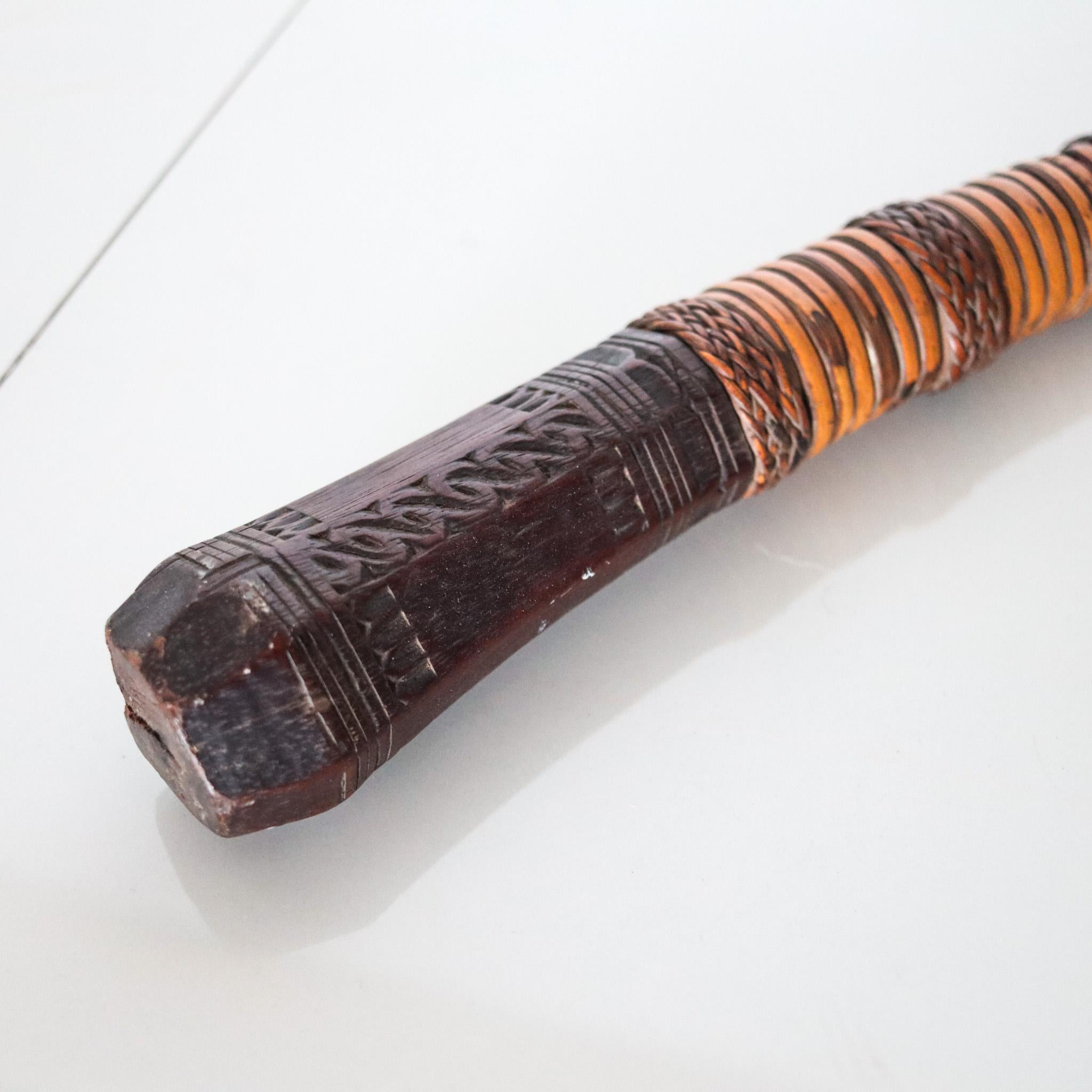 Hand-Carved Philippines 19th Century Panabas Iron Sword With Carved Wood And Rattan Handle For Sale