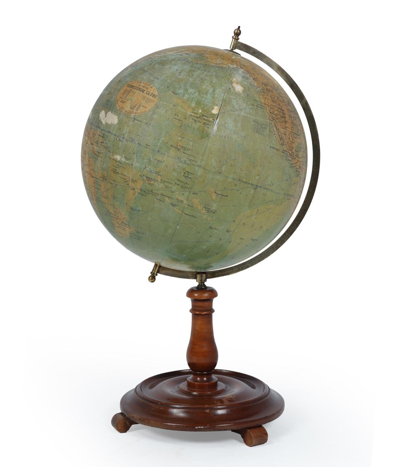 Philips 14 inch Terrestrial globe c1920
Philips 14 inch Terrestrial globe on a turned walnut stand. This desktop globe dates from 1920-1930. The colour is good, aged but retaining clarity. In one main area, the paper has been rubbed through to the