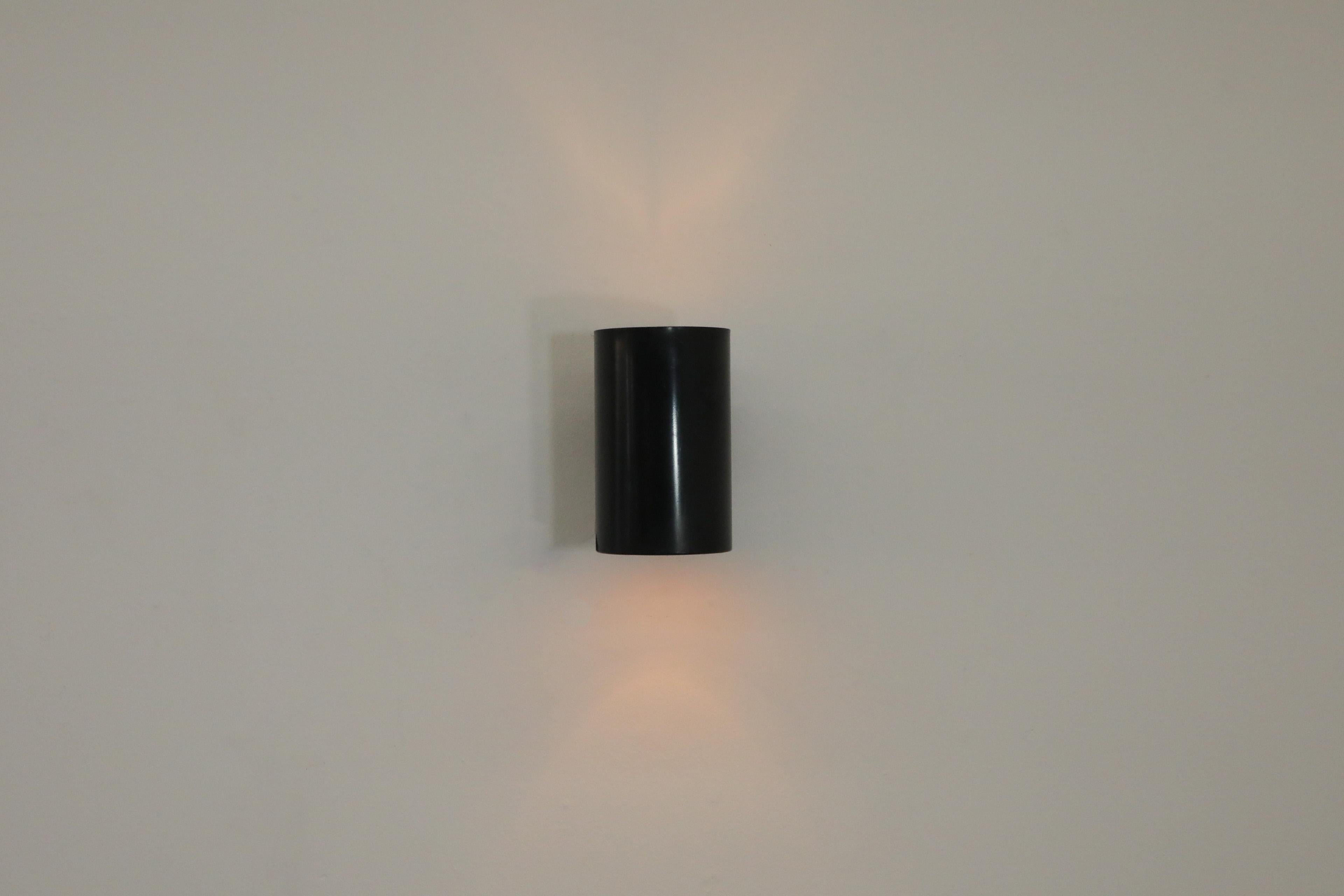 Mid-Century Modern Philips Black Enameled Cylinder Wall Sconces For Sale