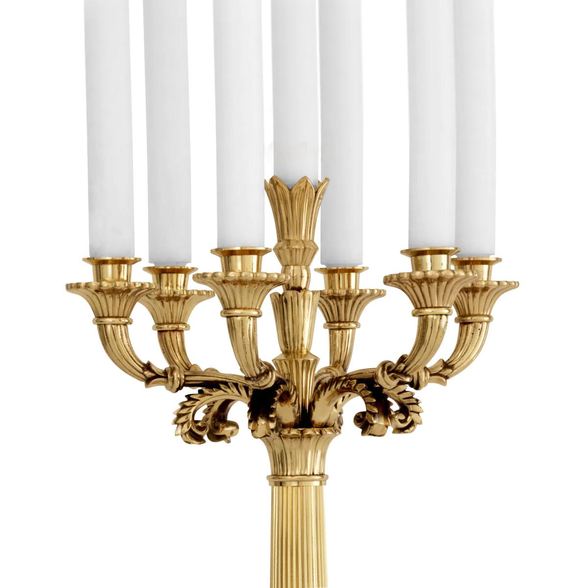 Portacandele Philips Brass con struttura in ottone massiccio
in finitura lucida con 7 portacandele, candele non incluse.