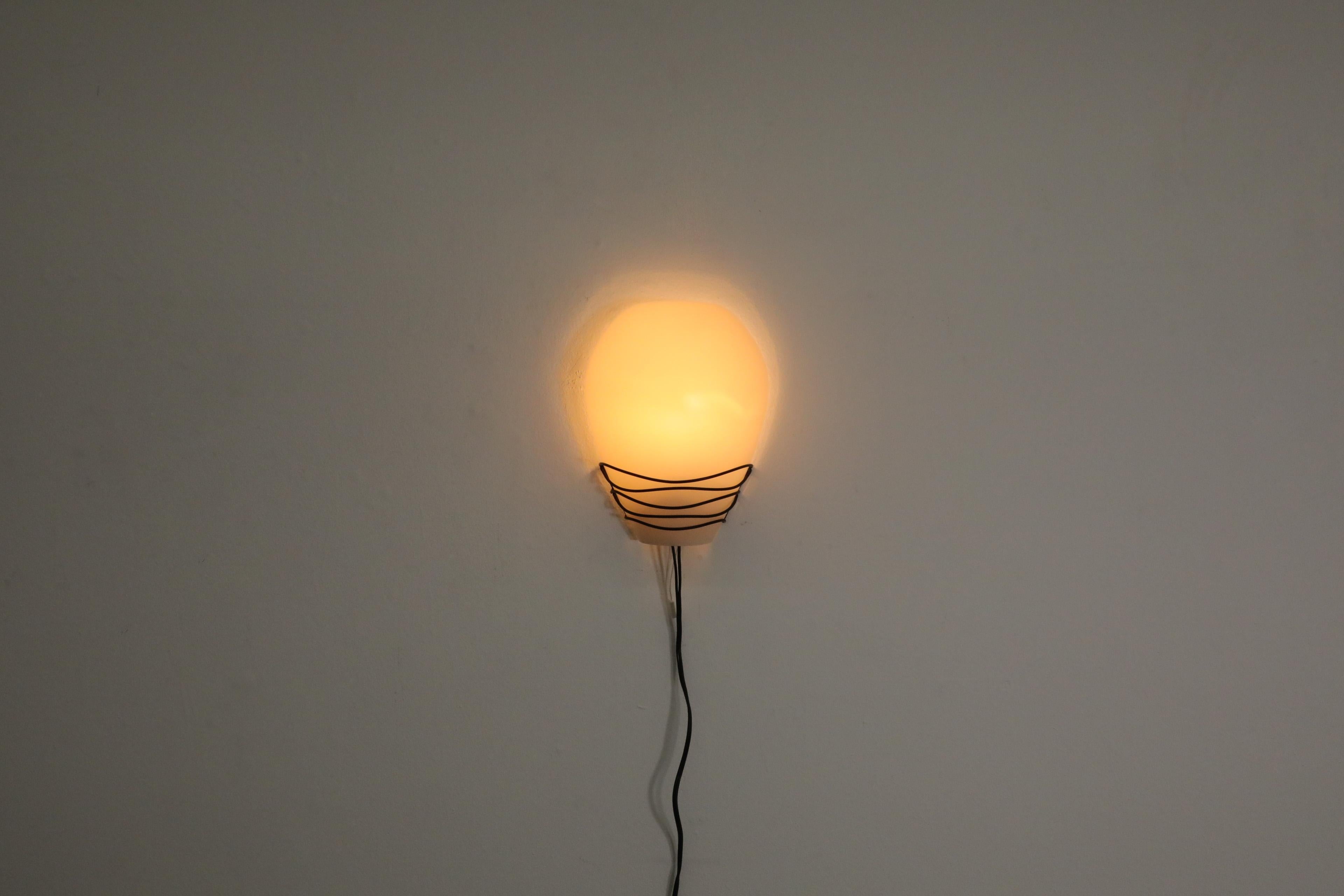Dutch Philips Wall Sconce with Black Wire Mount and Milk Glass Shade, 1950's For Sale