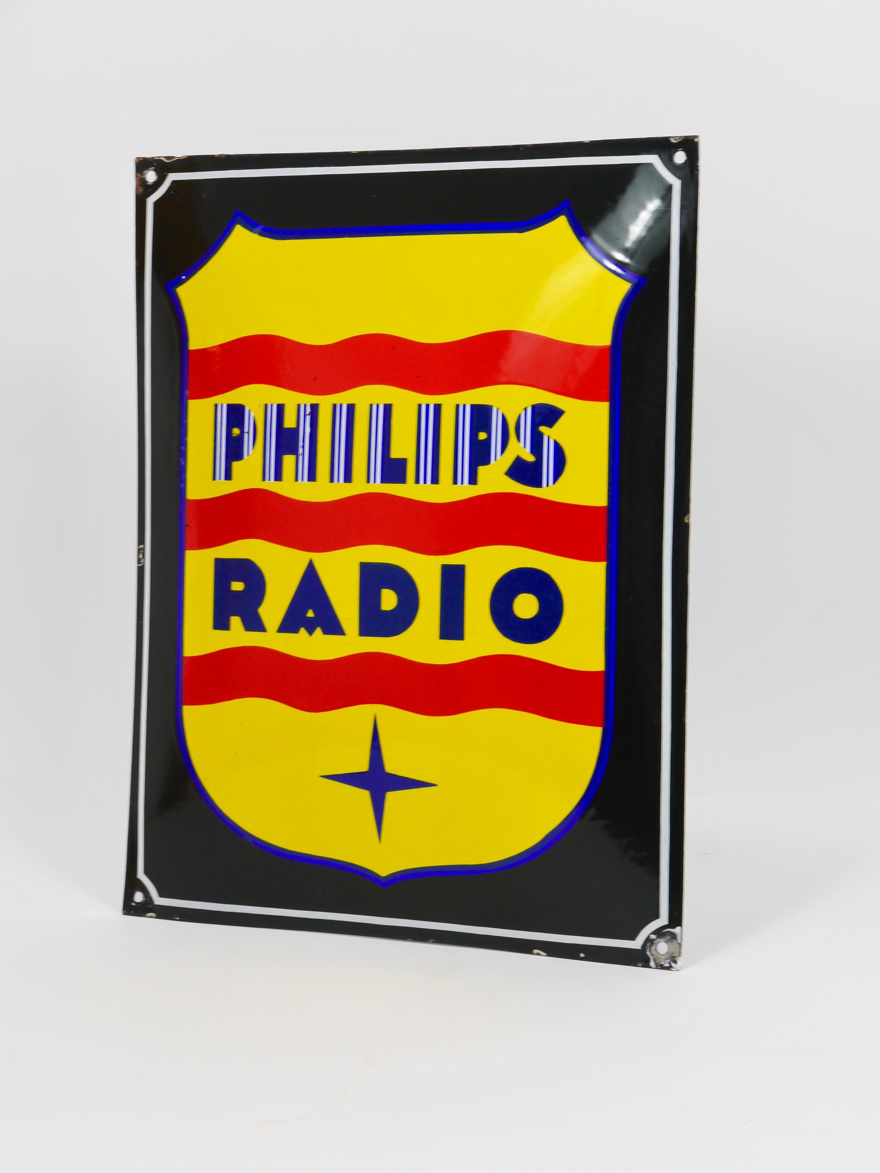 An enameled advertising sign / wall plaque 