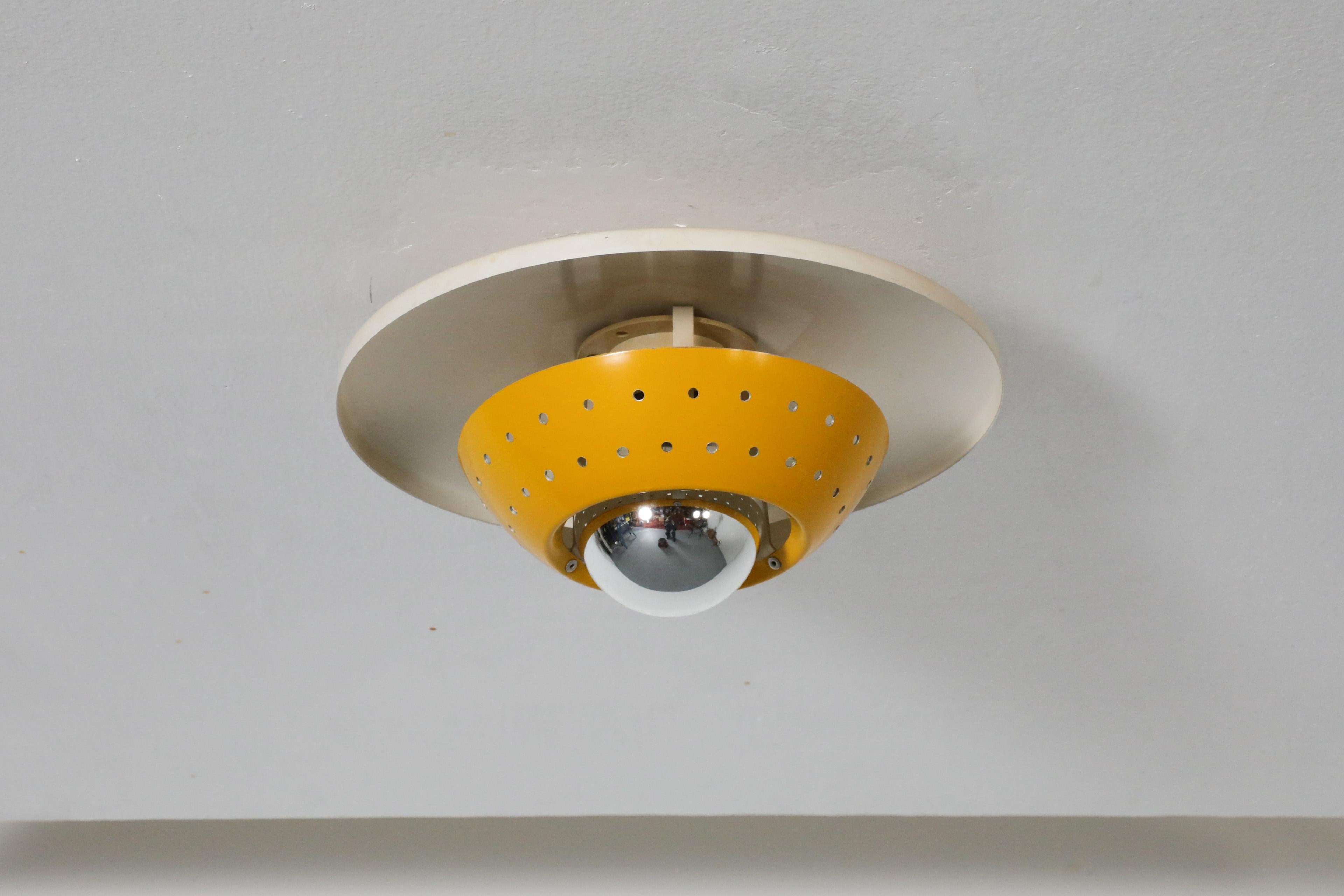 Dutch Philips Style Perforated Yellow Enameled Metal Ceiling Lamp For Sale
