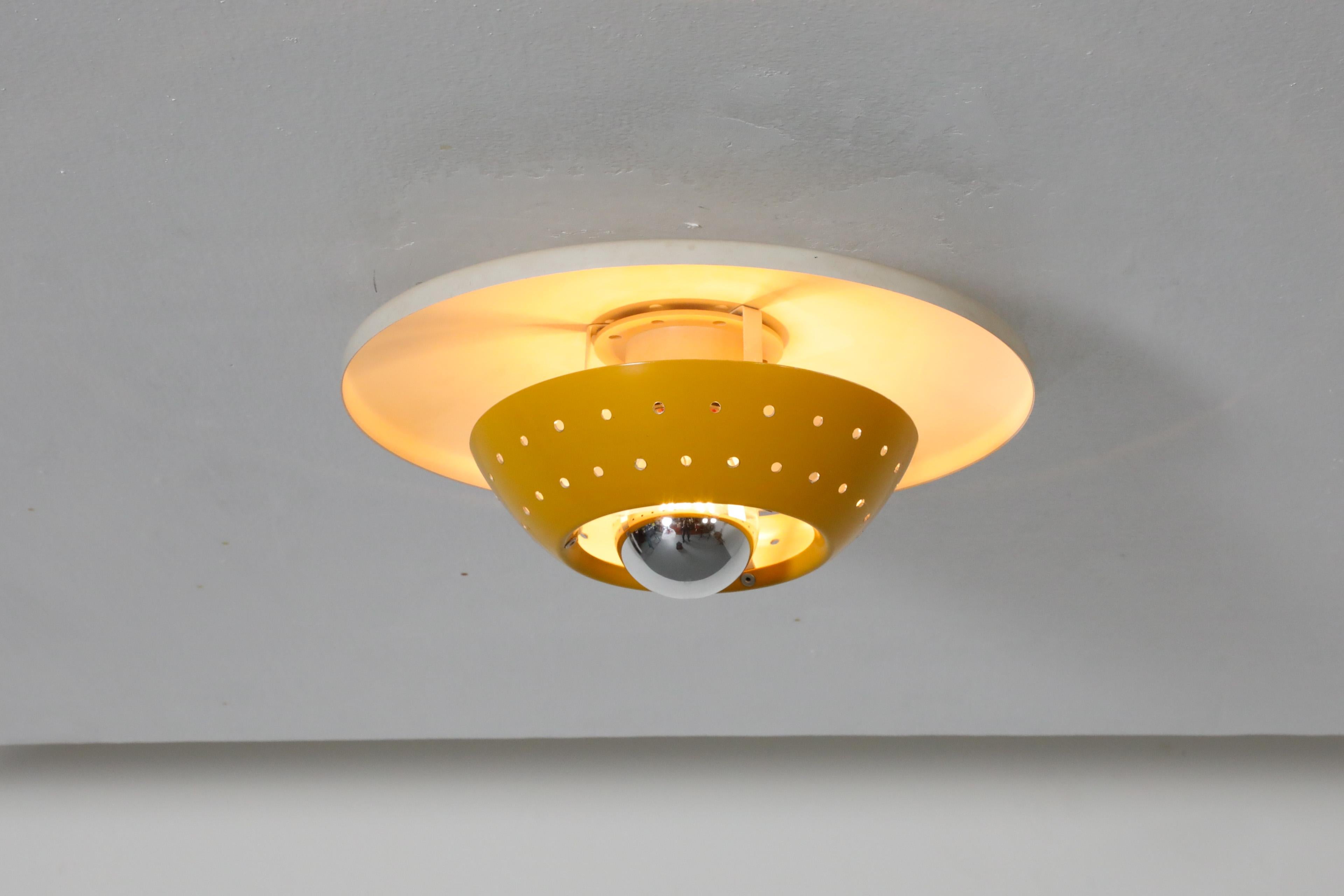 Philips Style Perforated Yellow Enameled Metal Ceiling Lamp In Good Condition For Sale In Los Angeles, CA