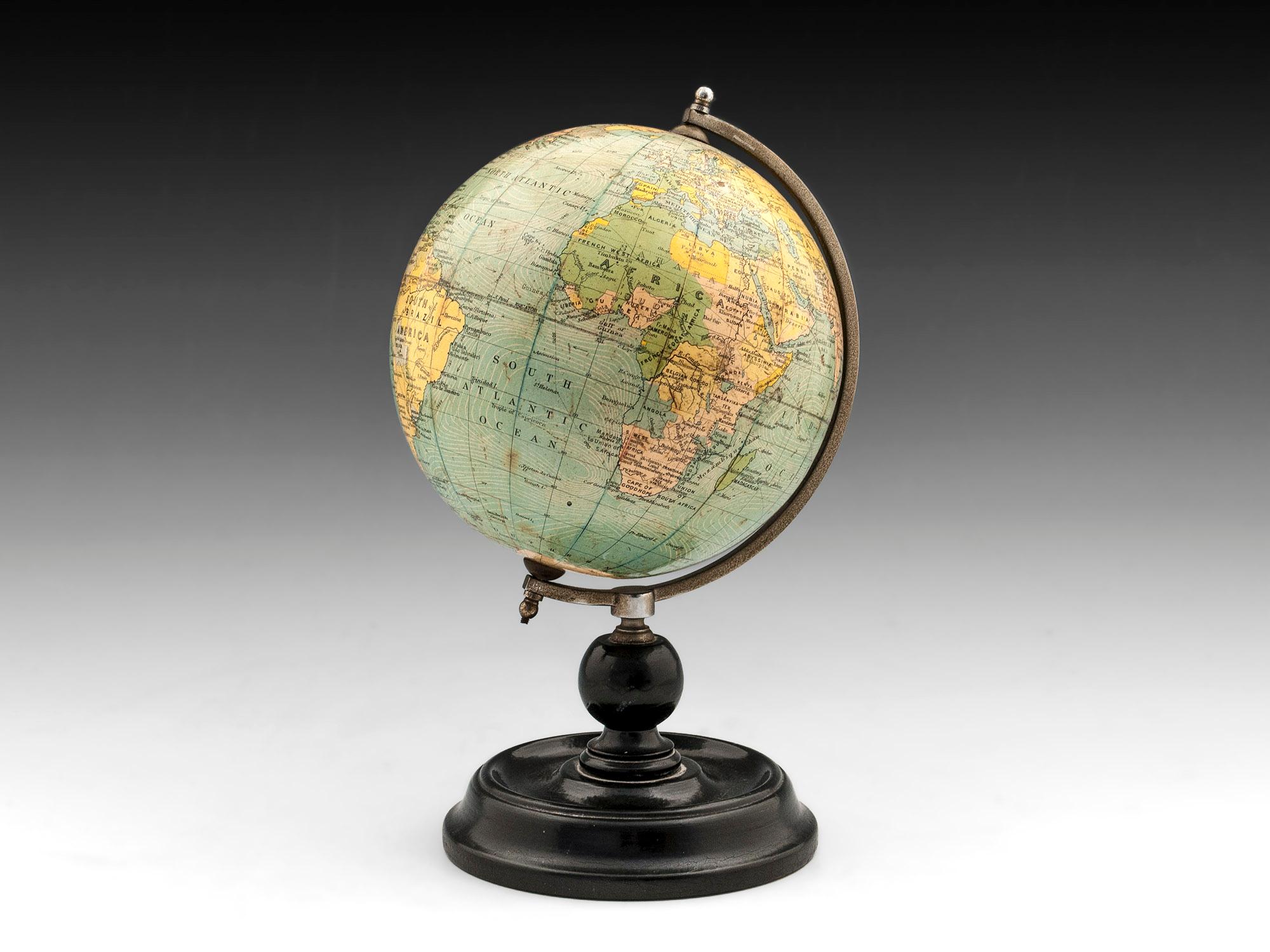 Terrestrial globe by George Phillips & Sons Ltd, Fleet Street, London. 

The six inch terrestrial globe is in superb A1 condition. The brass chapter has a lovely untouched colour and is threaded into the turned ebonized base.