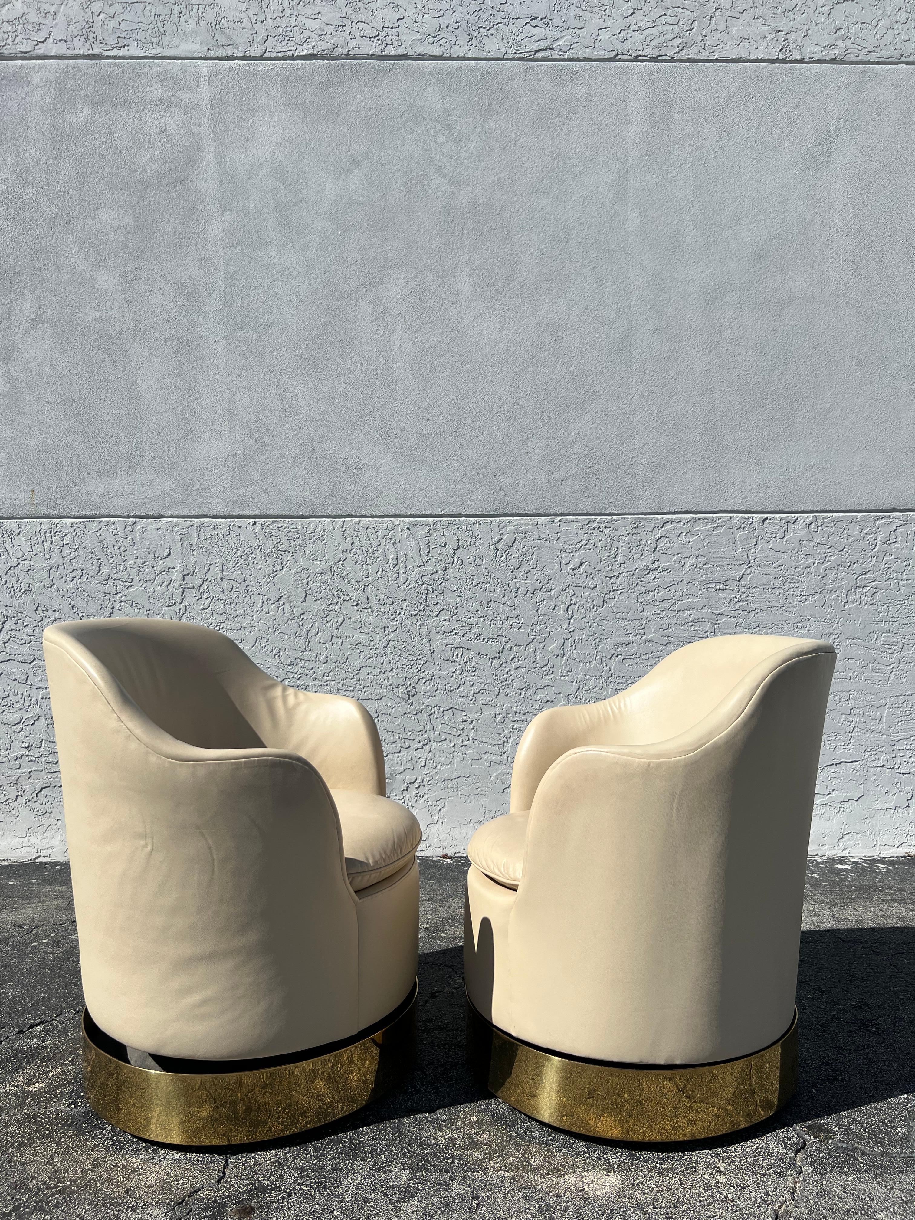 Mid-Century Modern Phillip Enfield Brass Swivel Lounge Chairs, a Pair For Sale