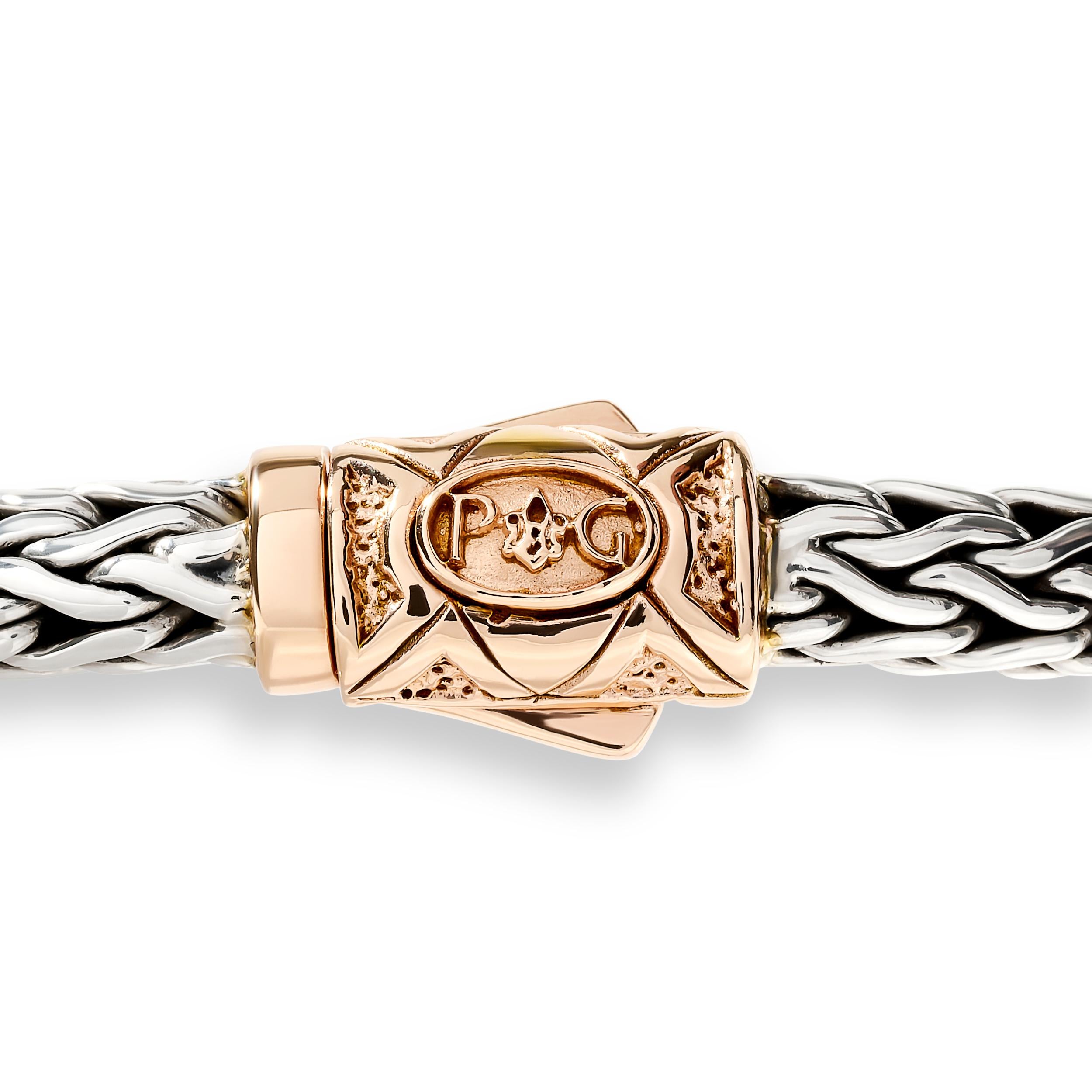 Questo bracciale Phillip Gavriel presenta una delicata catena di grano rosa in argento sterling, punteggiata da scintillanti stazioni di zirconi per un tocco di sottile glamour.

Firmato 