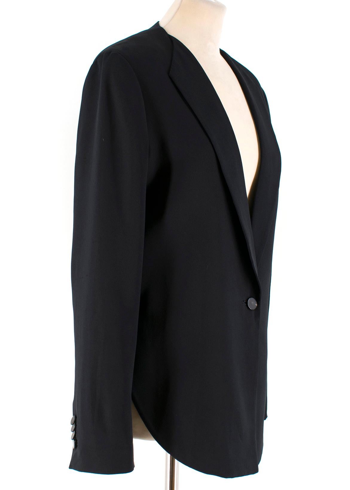 Phillip Lim cropped-back silk-faille jacket 

- Black, lightweight silk-faille 
- Collarless, notch lapel
Long sleeves, lightly padded shoulders, button-fastening cuffs 
- Cropped back, tail front design
- Single chest welt pocket 
- Single breasted