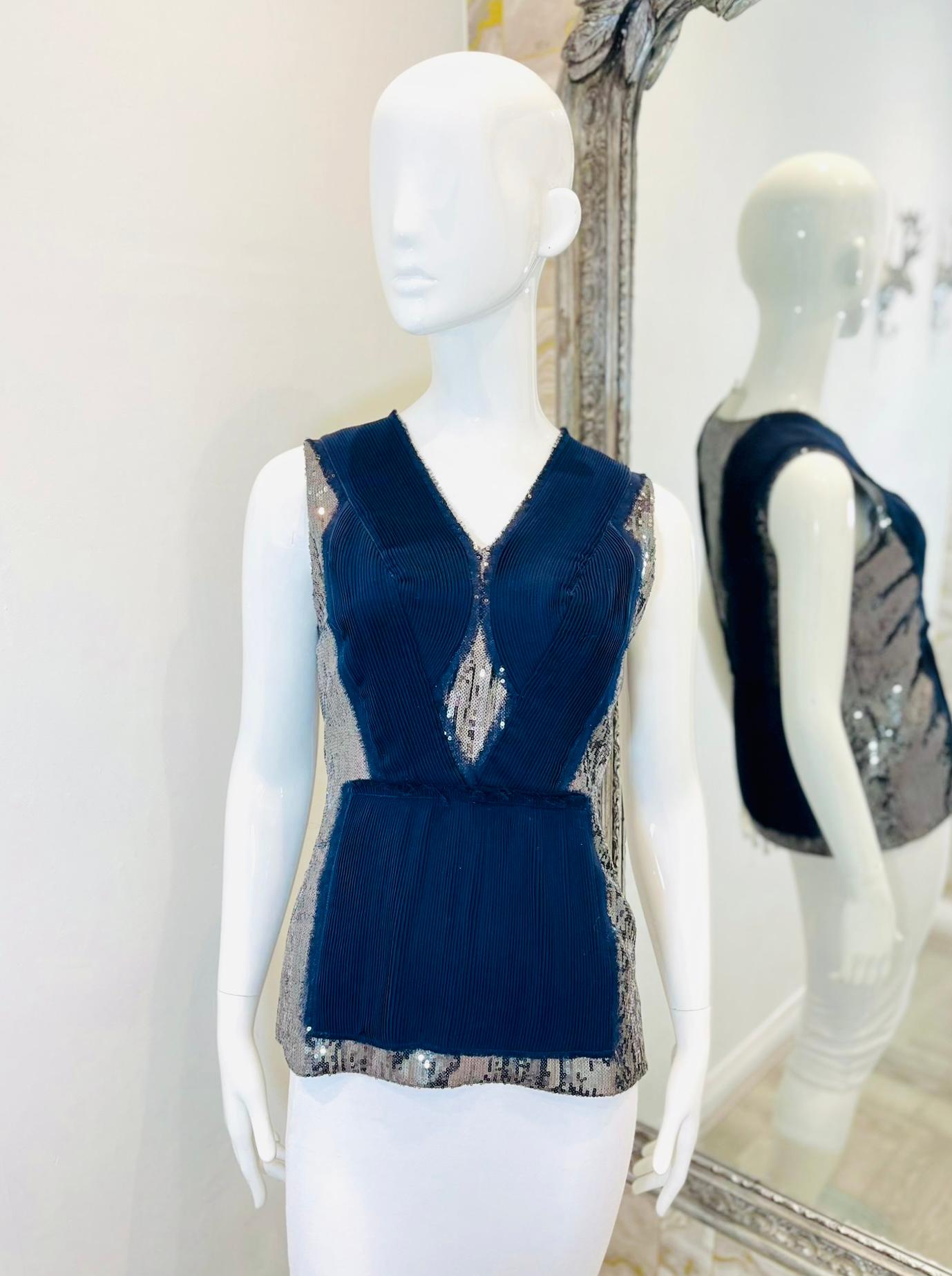 Phillip Lim Sequin Embellished Top

Navy, sleeveless top designed with textured panels and embellished with silver sequin inserts to the side, centre and rear.

Detailed with raw edges and V-Neckline.

Size – 6US

Condition – Very Good

Composition