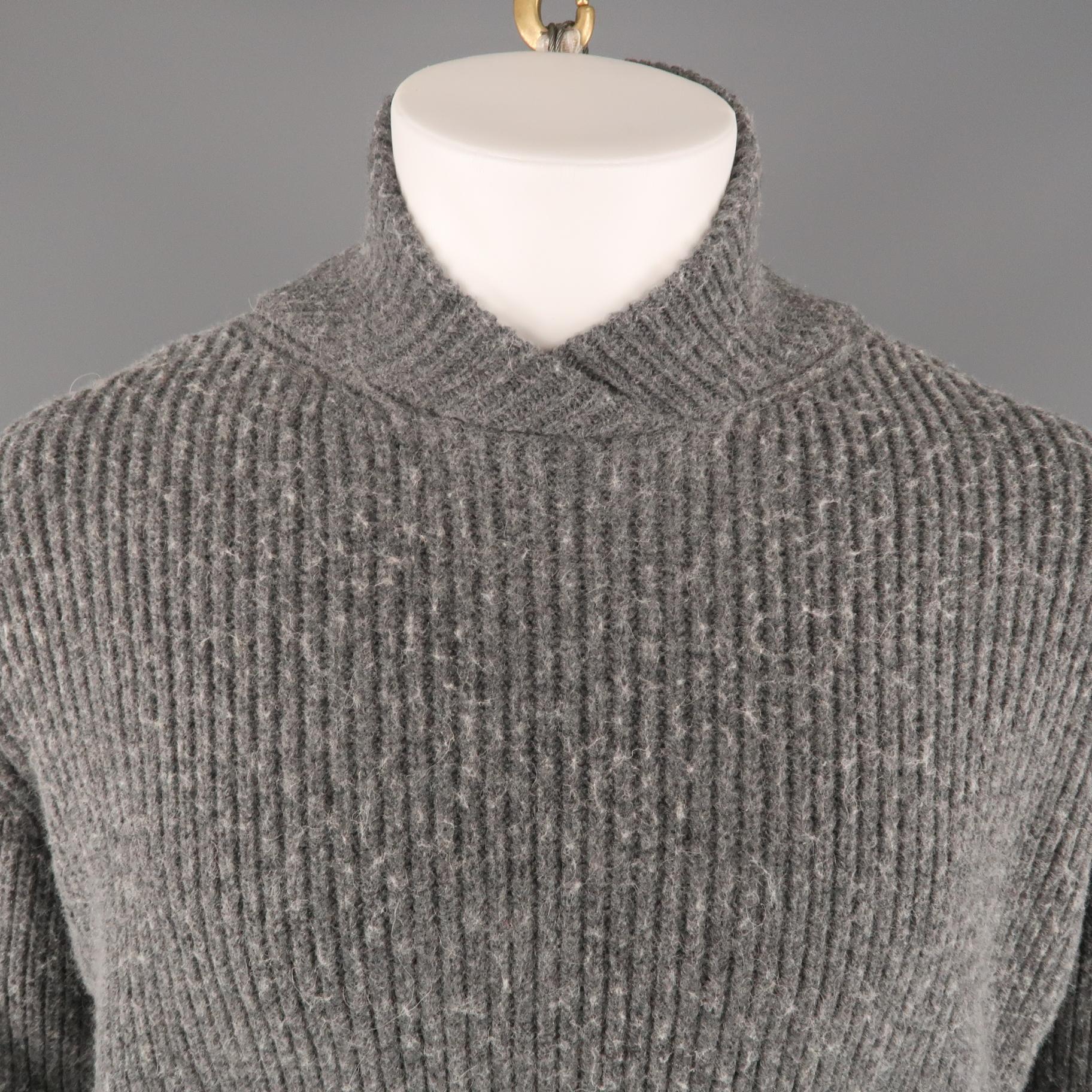 PHILLIP LIM sweater comes in a gray distressed viscose blend featuring a shawl collar style.
 
Very Good Pre-Owned Condition.
Marked: S
 
Measurements:
 
Shoulder: 21 in.
Chest: 50 in.
Sleeve: 26 in.
Length 24 in.