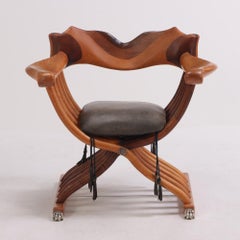 Phillip Lloyd Powell (American, 1919-2008) Custom folding Savonarola chair.