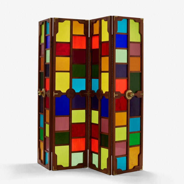 Phillip Lloyd Powell
screen
USA, c. 1965
American black walnut, glass, brass
96 w × 1.75 d × 95.5 h inches

Large four-panel custom screen by Phillip Lloyd Powell. Carved walnut detail and found glass.