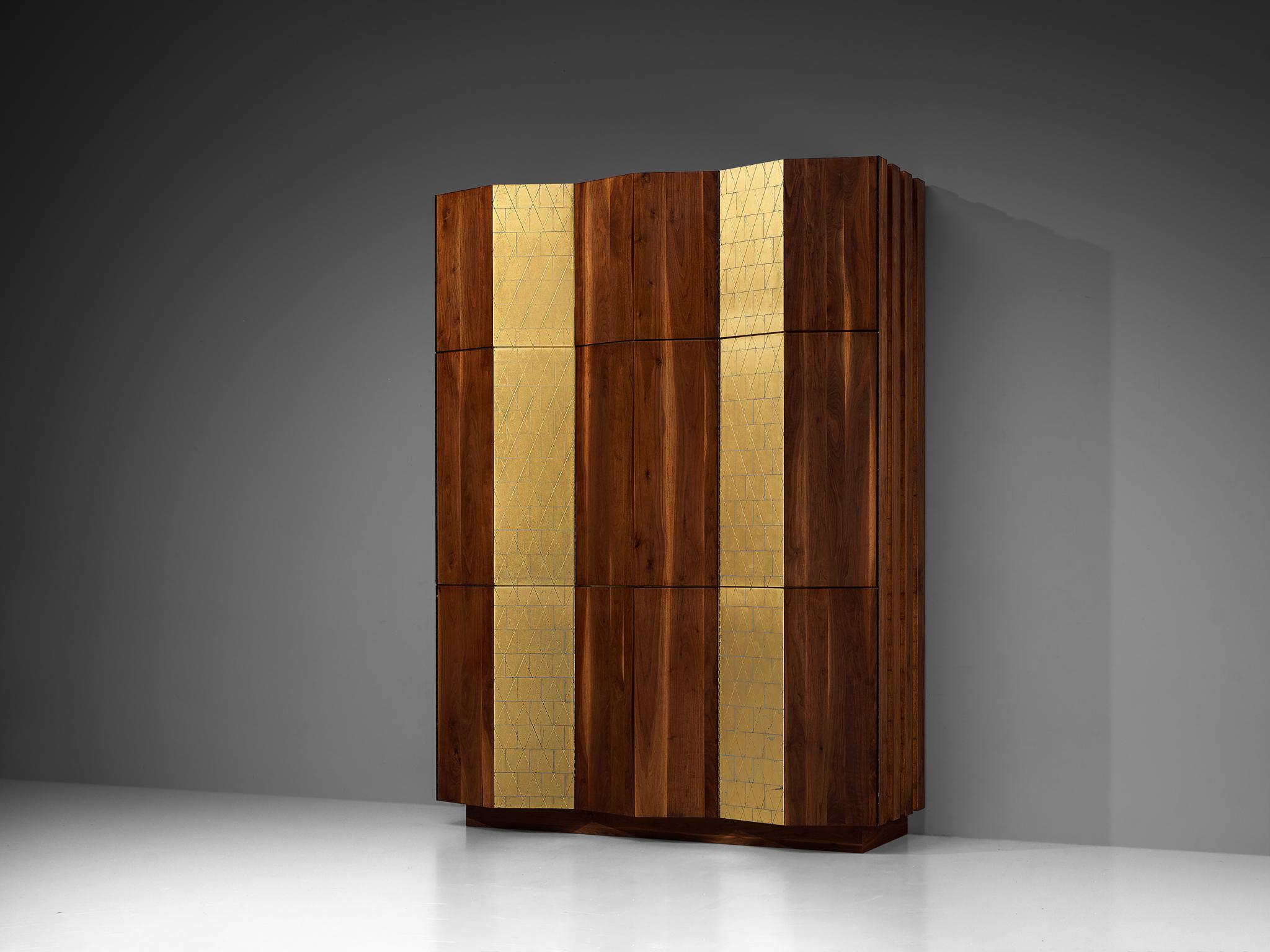 Phillip Lloyd Powell, large cabinet, walnut, gold leaf, painted wood, United States, circa 1965

Crafted by the skilled hands of Phillip Lloyd Powell, this highboard stands as a testament to the designer’s bespoke artistry. It is a unique creation