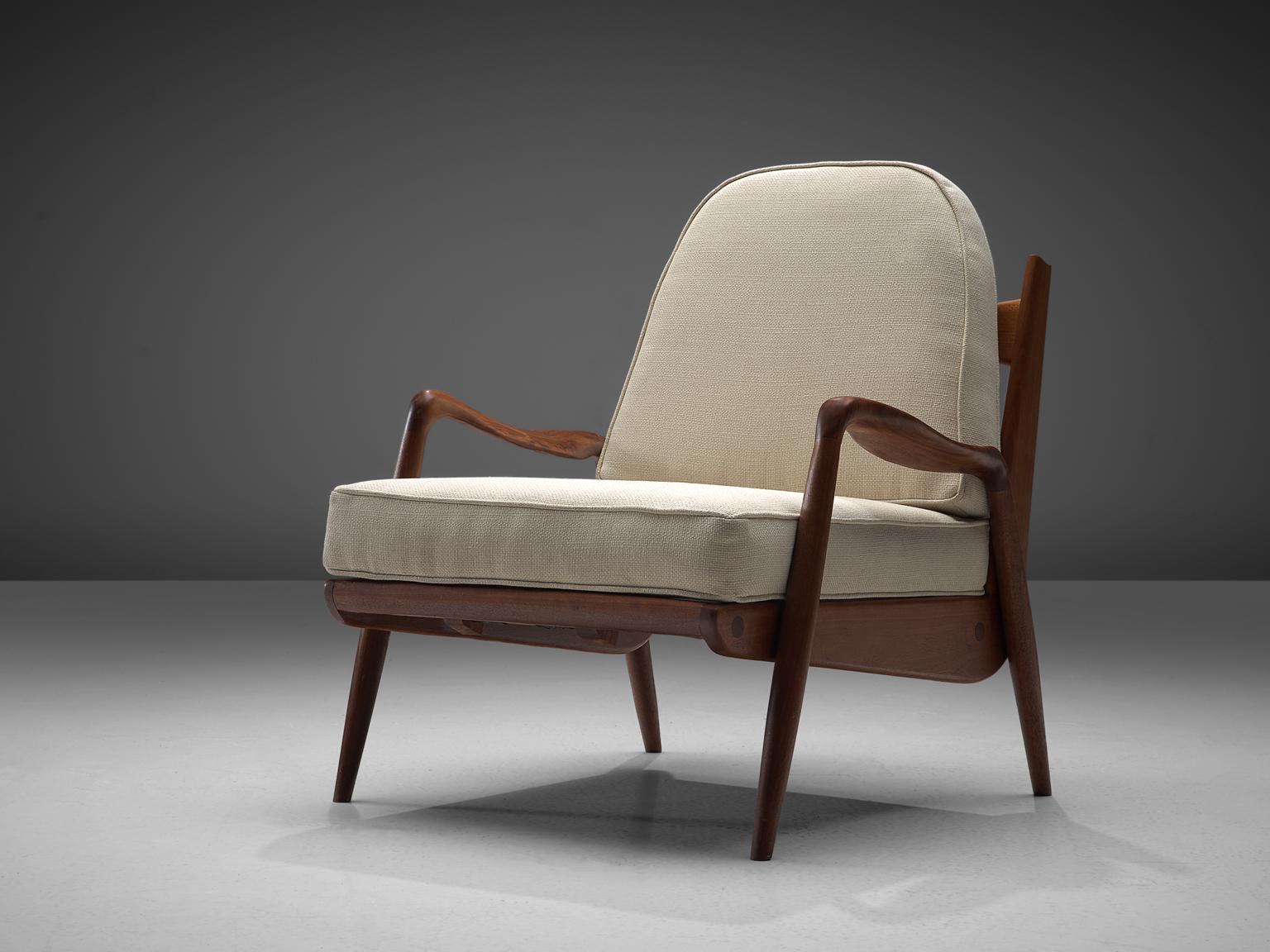 Philip Lloyd Powell, 'New Hope' lounge chair, American walnut and white fabric upholstery, United States, 1960s.

This comfortable armchair made out of American walnut and fabric upholstery is designed by Philip Lloyd Powell. The name 'New Hope'