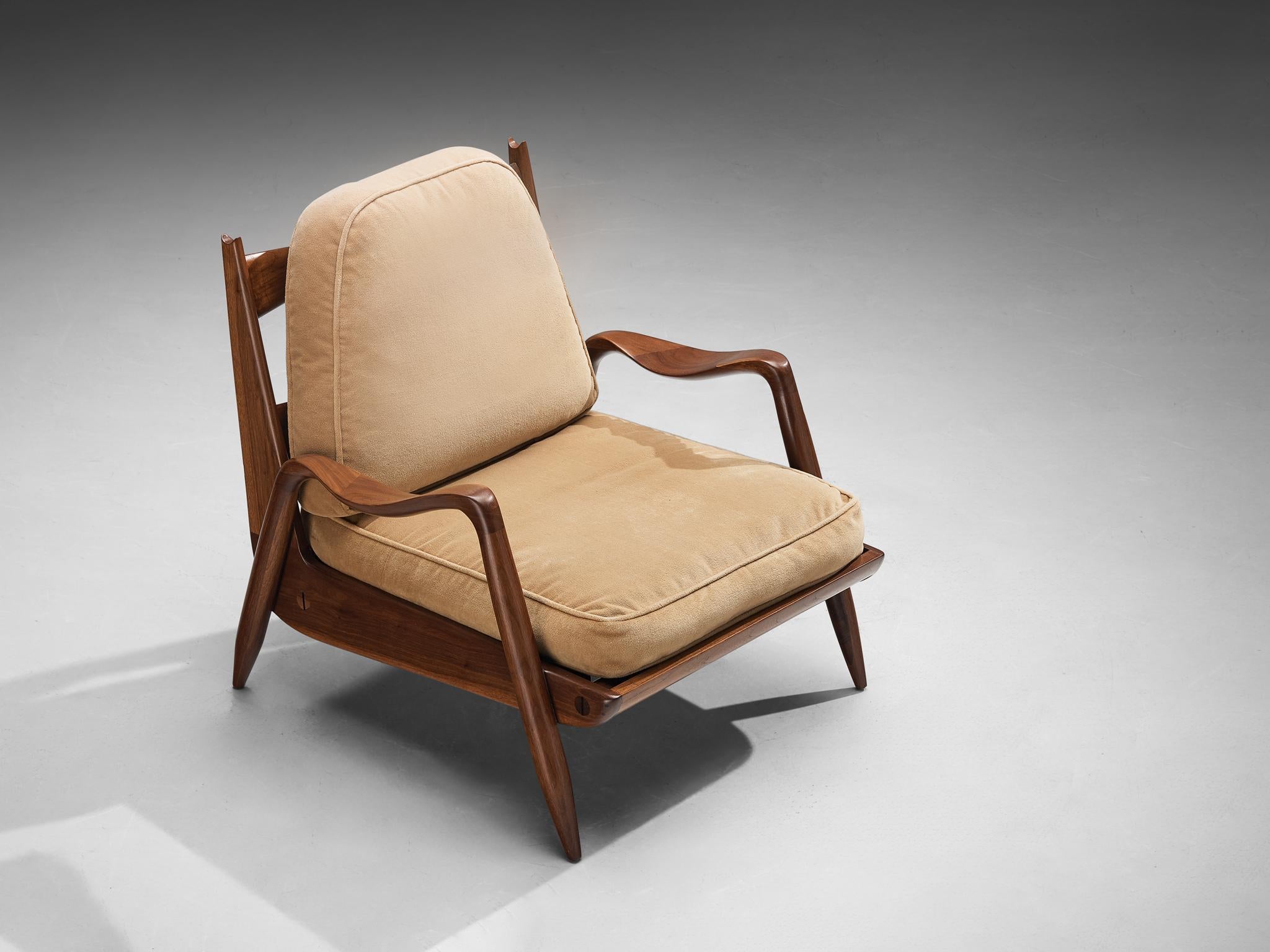 Philip Lloyd Powell, lounge chair ‘New Hope’, American walnut, fabric, United States, 1960s

Often described as a “Mid-Century Modernist”, American designer Phillip Lloyd Powell (1920-2008) created pieces that transcended the Modernist style in both