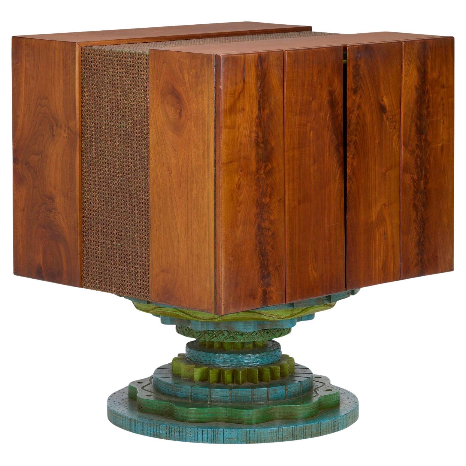 Phillip Lloyd Powell Rotating Walnut Case / Bar, 1965 For Sale