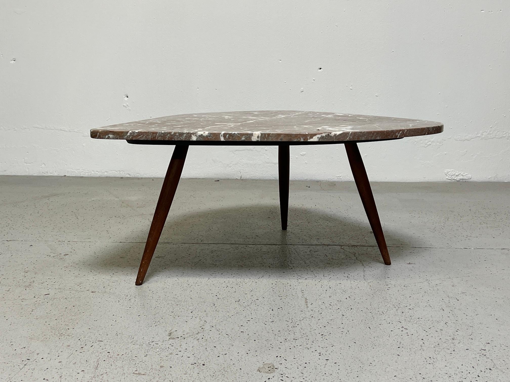 A marble top table by Phillip Lloyd Powell, 1950's.