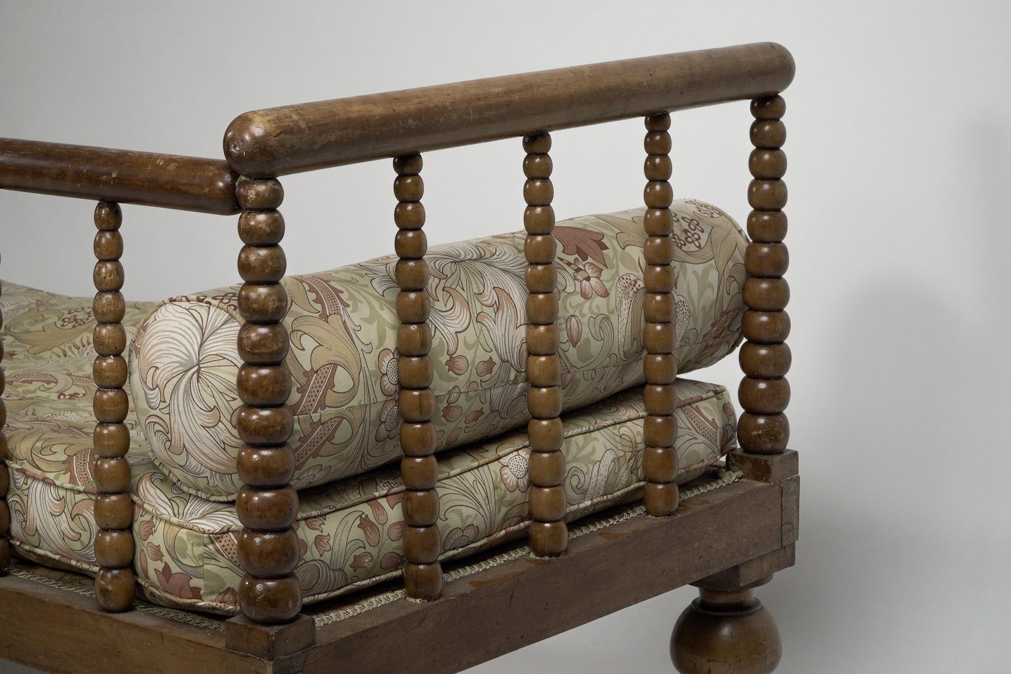 Late 19th Century Phillip Webb A large Aesthetic Movement bobbin turned Satinwood chaise lounge For Sale