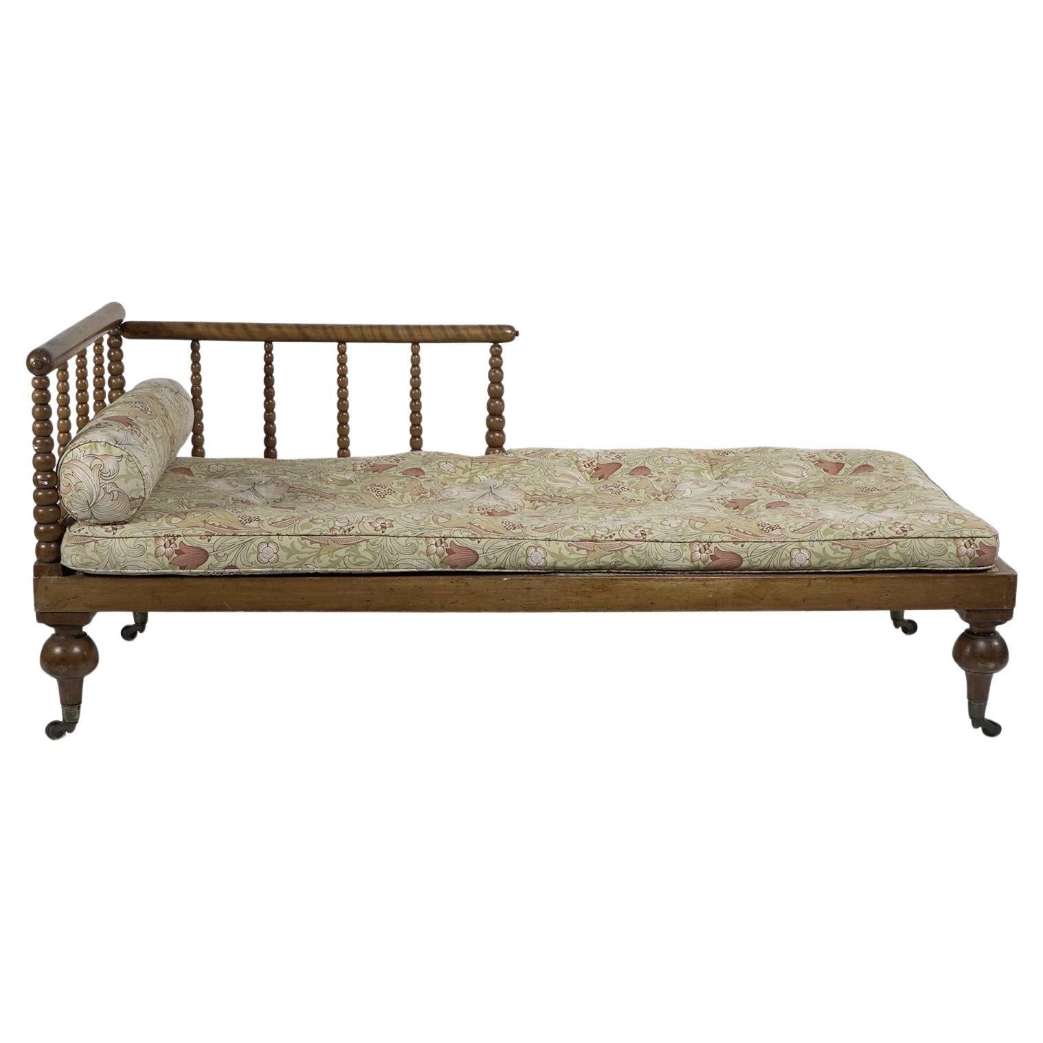 Phillip Webb A large Aesthetic Movement bobbin turned Satinwood chaise lounge For Sale