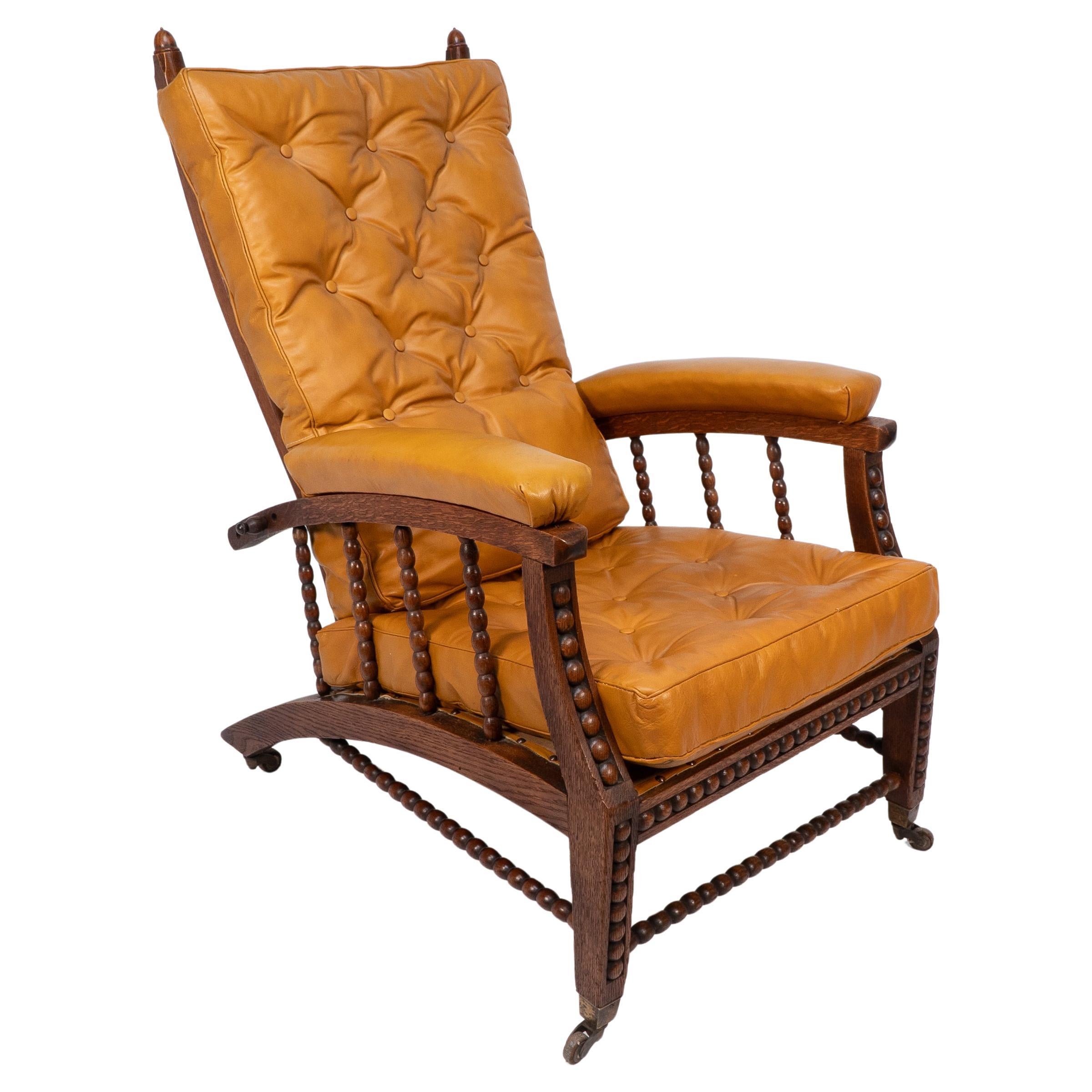 Phillip Webb for Morris & Co. English Aesthetic Movement oak reclining armchair For Sale