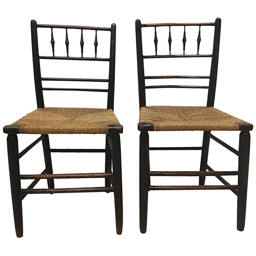 Phillip Webb for William Morris, An Original Pair of Sussex Ebonised Side Chairs