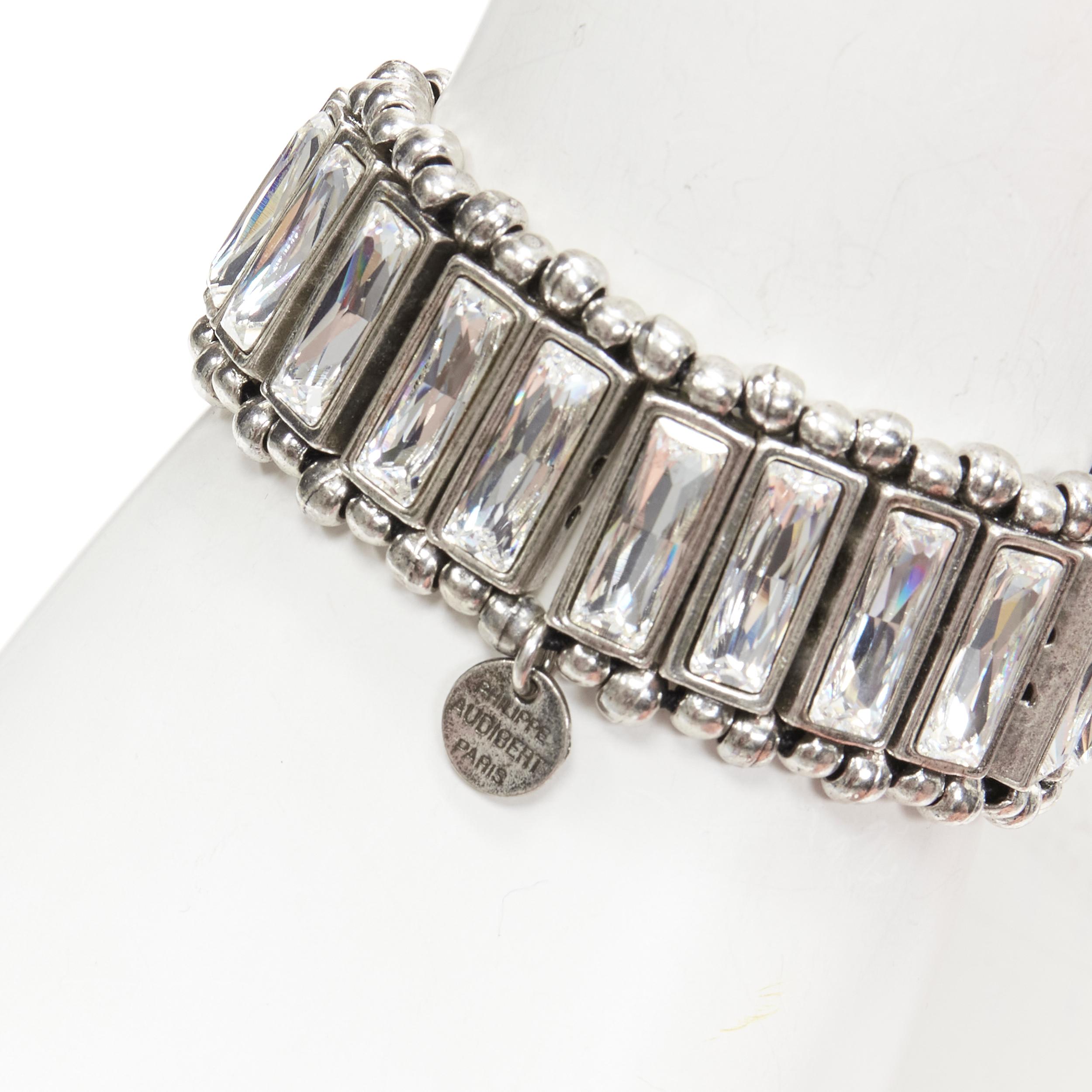 PHILLIPE AUDIBERT antique silver bead baguette crystal elastic bracelet
Reference: ANWU/A00288
Brand: Phillipe Audibert
Material: Metal
Color: Silver
Closure: Elasticated

CONDITION:
Condition: Very good, this item was pre-owned and is in very good