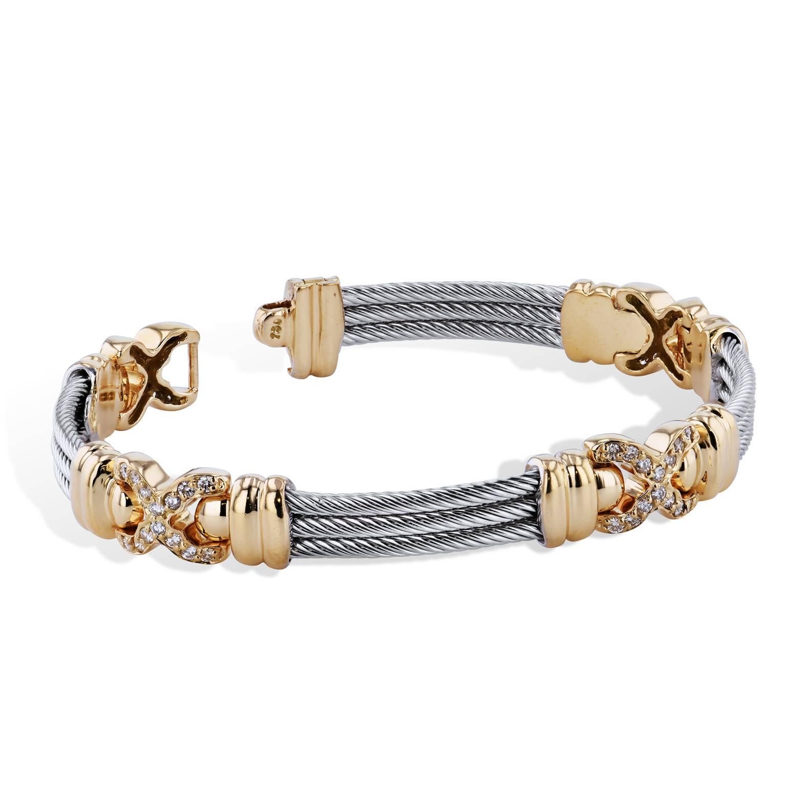 Enjoy this previously loved Phillipe Chariol 18 karat yellow gold bracelet featuring three rows of cable cinctured by fifty-six pave-set diamond in criss-cross design.