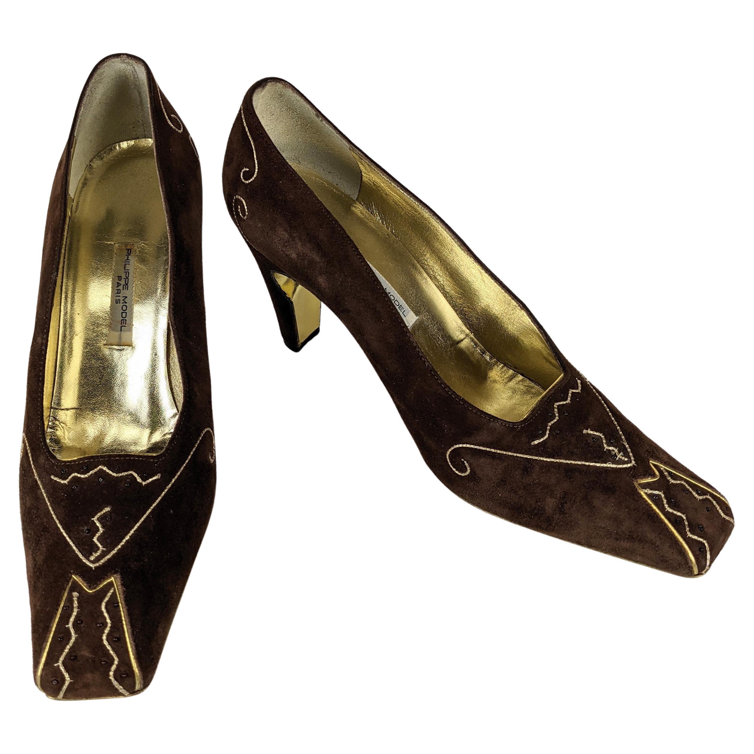 Phillipe Model Suede and Gold Kid Pumps. Unusual square tip pumps in dark chestnut suede with gold soutache abstract embroidery with tiny brown seed beads. 
Lined in gold kid interior and sole. Unusual cut out heel treatment. 
Designed in Paris.