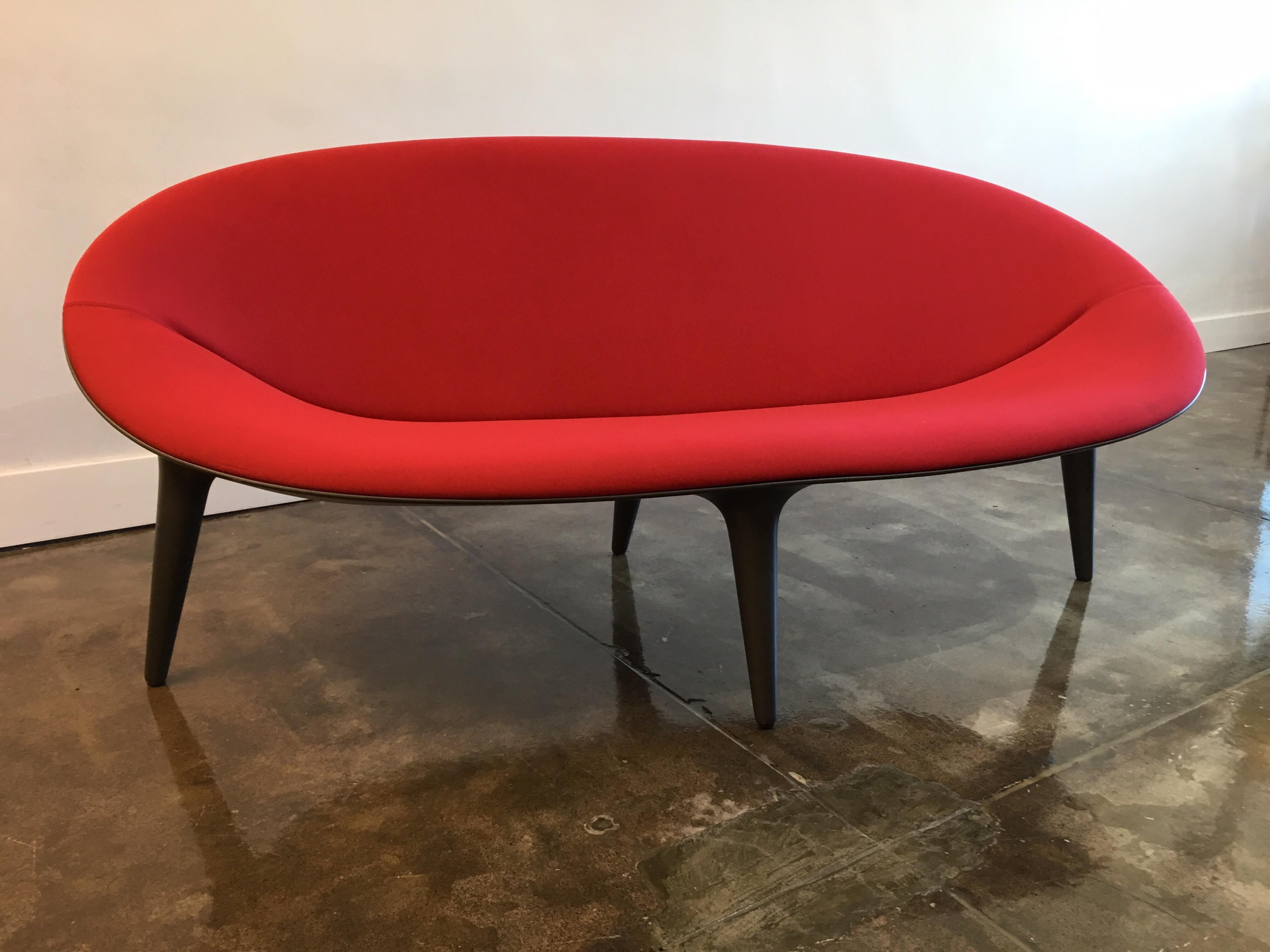 Phillips Starck 'Strange Thing' Sofa for Cassina. 

Unique sculptural biomorphic design, very desirable, rare Strange Thing sofa produced by Cassina, Italy in 2002. Very limited production, featuring Red Giano neoprene fabric with a Titanium grey