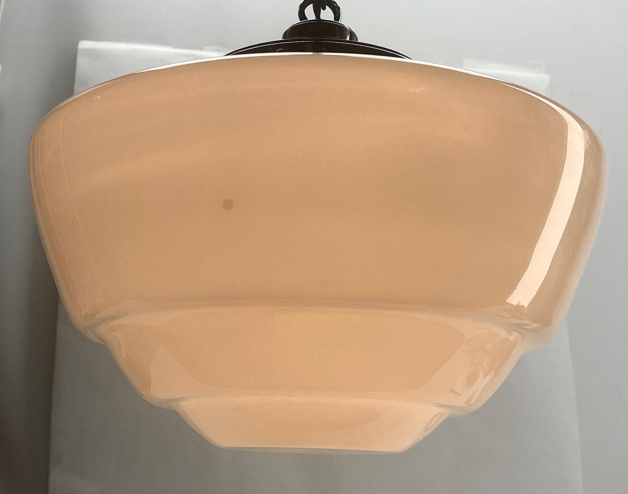 From the range by Phillips netherlands, this centre-light is on a chain. 30 cm
The lamp has a fitting on a Solid chrome plate and holds a shade of opaline glass.

We are happy to adjust the height to your wishes at no extra cost.  

In good