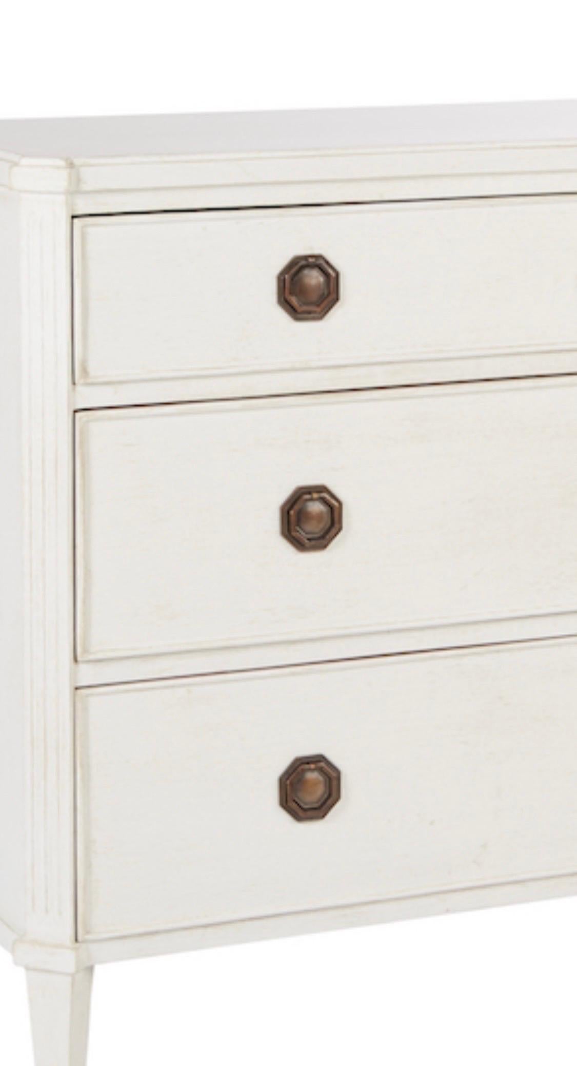 This timeless style European inspired chest is perfect. 

Phillips Scott Sophia Chest measures 48 inches wide by 20 inches deep by 36 inches high. This is a standard Philip Scott finish in shell white. This is their standard hardware in a tarnished