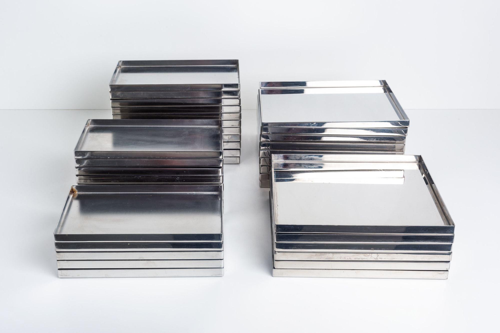 Italian Phillips Starck Custom Stainless Steel Dishes, set of Thirty-Eight For Sale