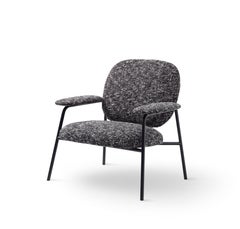 Fauteuil Philo en tissu noir/blanc soufflé et pieds noirs mats de Marco Zito