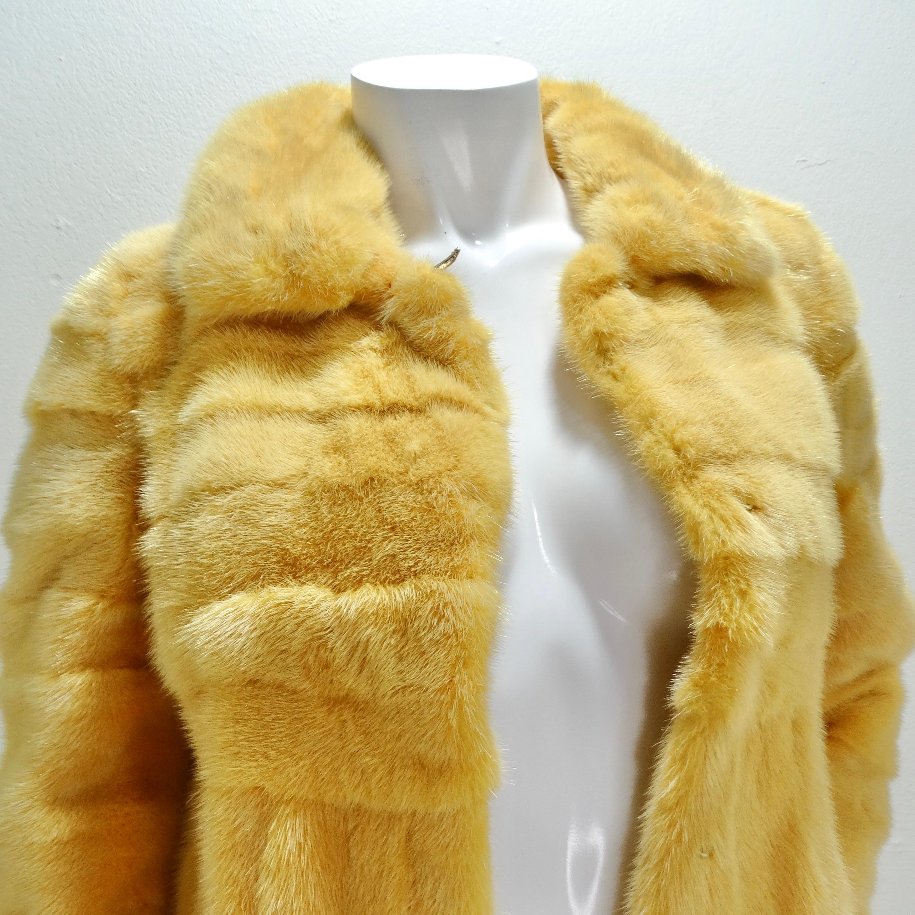 Introducing the Philosophy Di Alberta Ferretti 1990s Mustard Yellow Mink Fur Coat – a true embodiment of luxury, style, and timeless elegance. This extraordinary coat is not just an outerwear piece; it's a statement of individuality and