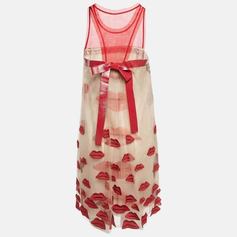 This dress from Philosophy di Alberta Ferretti is so pretty youll love flaunting it. The fabulous red and beige creation is made of the finest materials and features an elegant silhouette.