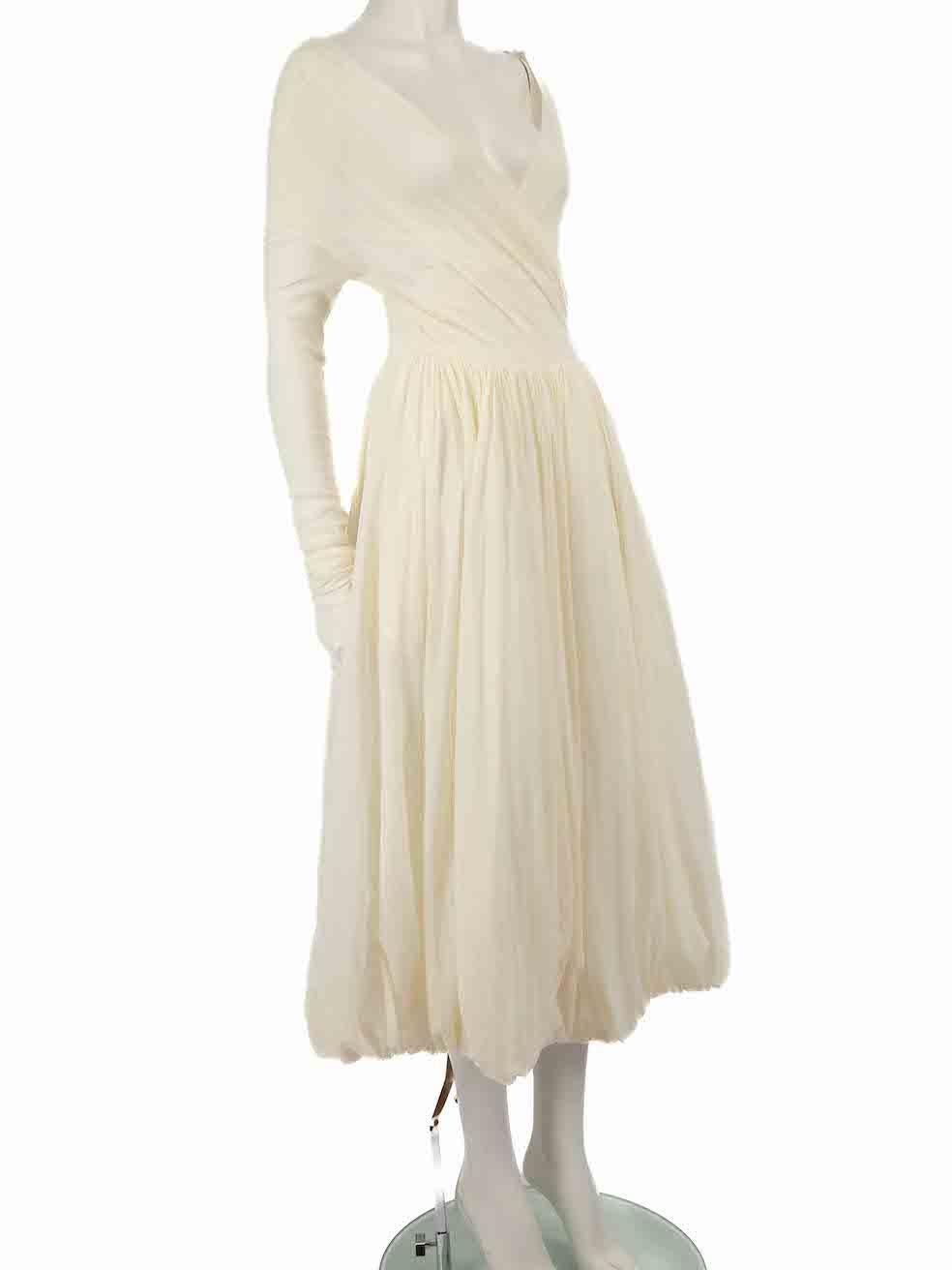 CONDITION is Very good. Minimal wear to dress is evident. Minimal wear to front waist and wrap edge with small marks to the fabric on this used Philosophy di Lorenzo Serafini designer resale item.
 
 
 
 Details
 
 
 Ecru
 
 Polyamide
 
 Gown
 
