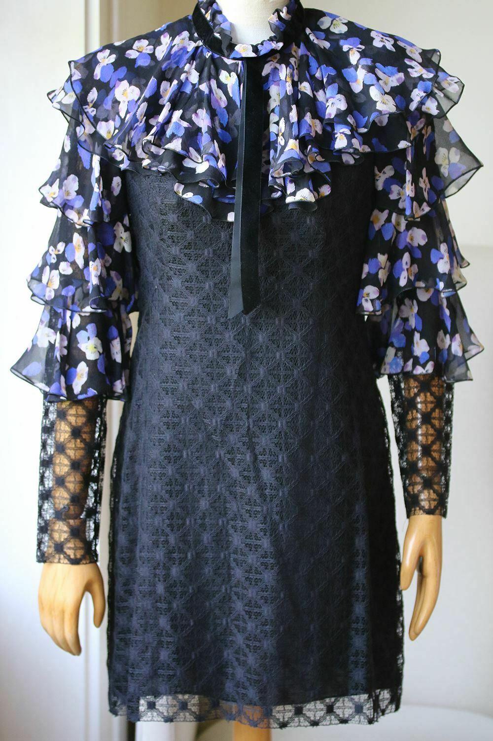 This Philosophy Di Lorenzo Serafini Printed Bib Mini Dress Features A Tiered Ruffles Along The Sleeve And Ruffle Mock Neck. Tiered Ruffles Along The Sleeve. Ruffle Mock Neck. Fully Lined. 100% Silk.

Size: UK 6 (US 2, FR 34, IT 38)

Condition: New