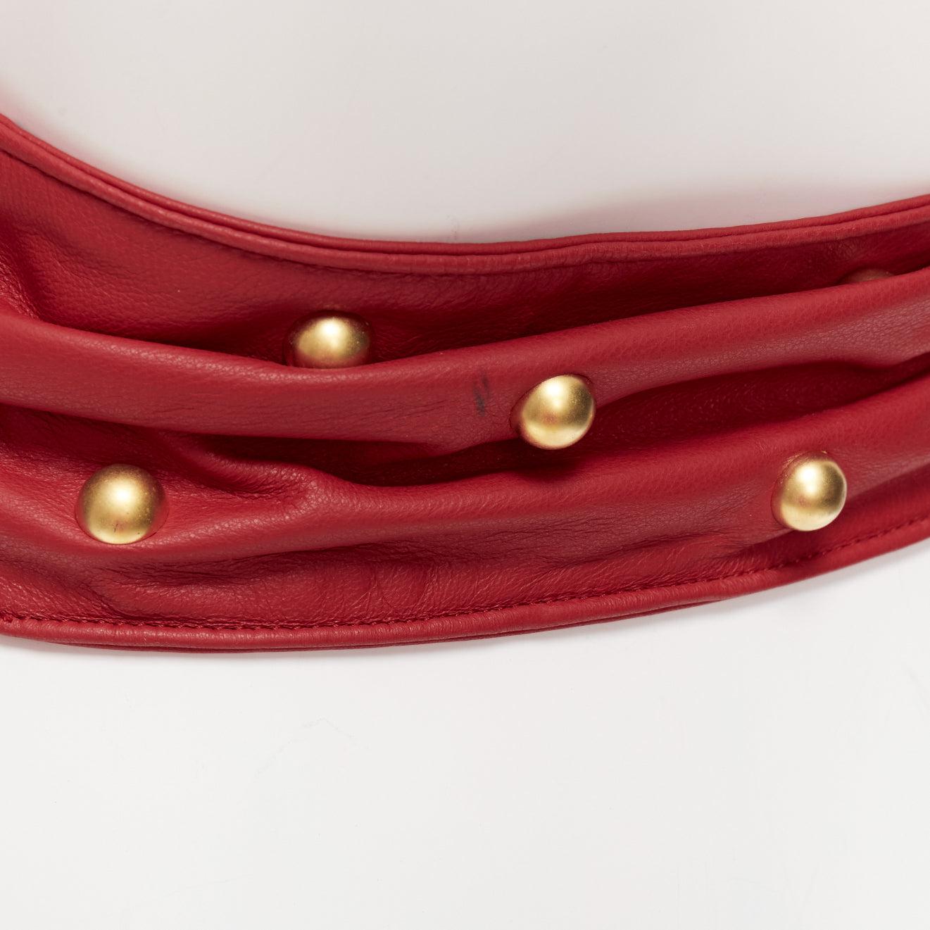PHILOSOPHY DI LORENZO SERAFINI red soft leather gold dome studs wide belt S
Reference: AAWC/A01207
Brand: Philosophy
Material: Leather
Color: Red, Gold
Pattern: Studded
Closure: Self Tie
Lining: Red Leather
Extra Details: Free size tie.
Made in: