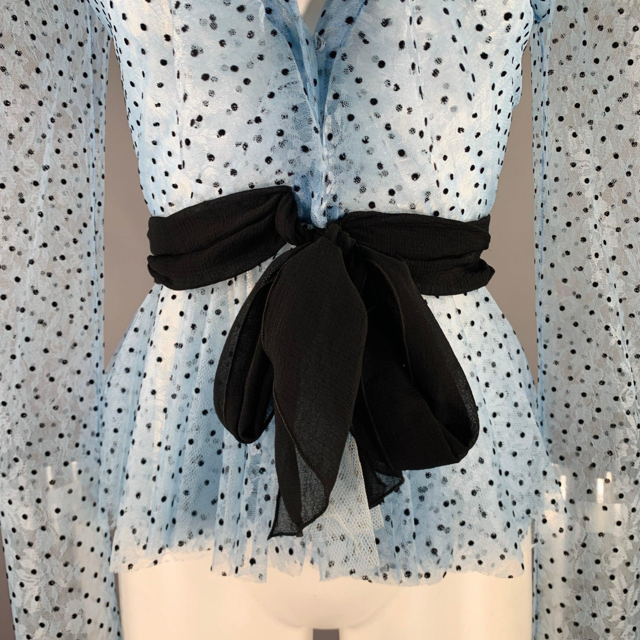 PHILOSOPHY di LORENZO SERAFINI blouse
in a blue polyester tulle featuring a polka dot pattern, ruffled shoulders, black belt tie, and snap closure. Very Good Pre-Owned Condition. Minor signs of wear on snaps. 

Marked:   IT 38 

Measurements: 
