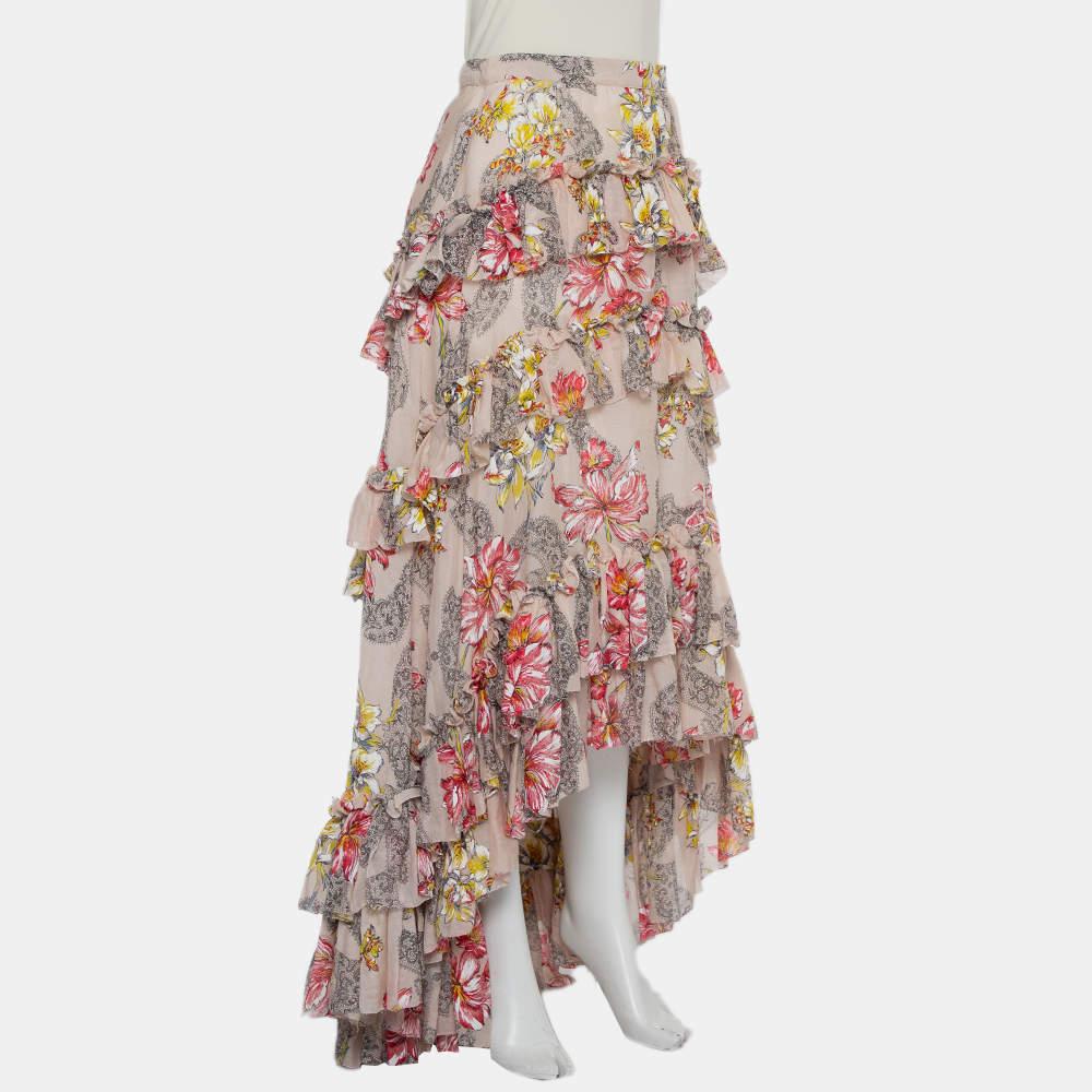 This stylish midi skirt comes from the house of Philosophy. Crafted from a cotton and silk blend, this luxurious creation flaunts an asymmetric hem and ruffles all over. It has a lovely floral print that adds interest. Pair with strappy heels and a