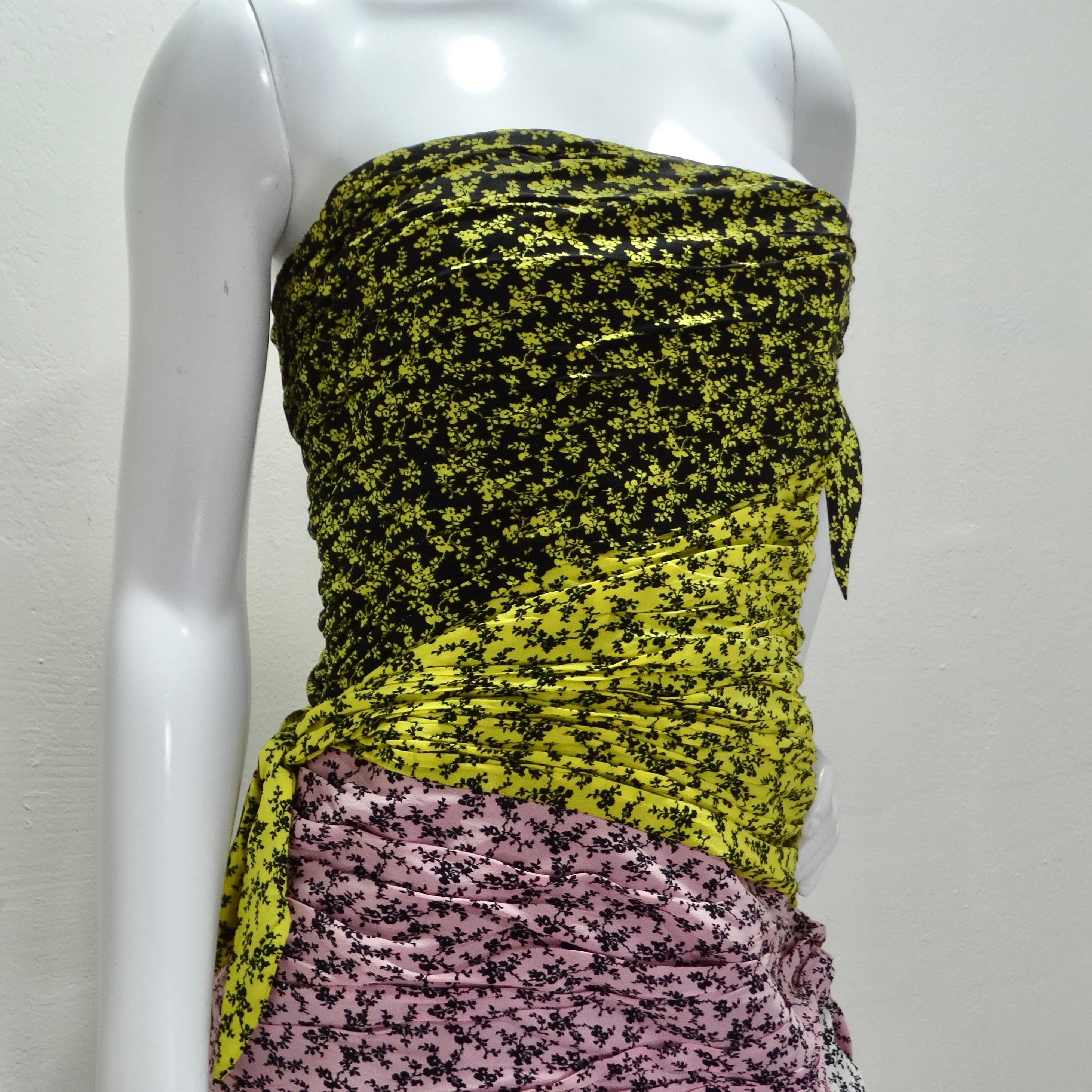 Introducing the Philosophy Silk Strapless Floral Ruched Dress, a bold and unique statement piece that exudes elegance and style. Crafted from luxurious 100% silk fabric, this strapless mini dress features a stunning yellow, pink, and black floral