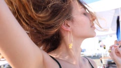 Phoenician Earrings is handmade of silver with 24ct gold